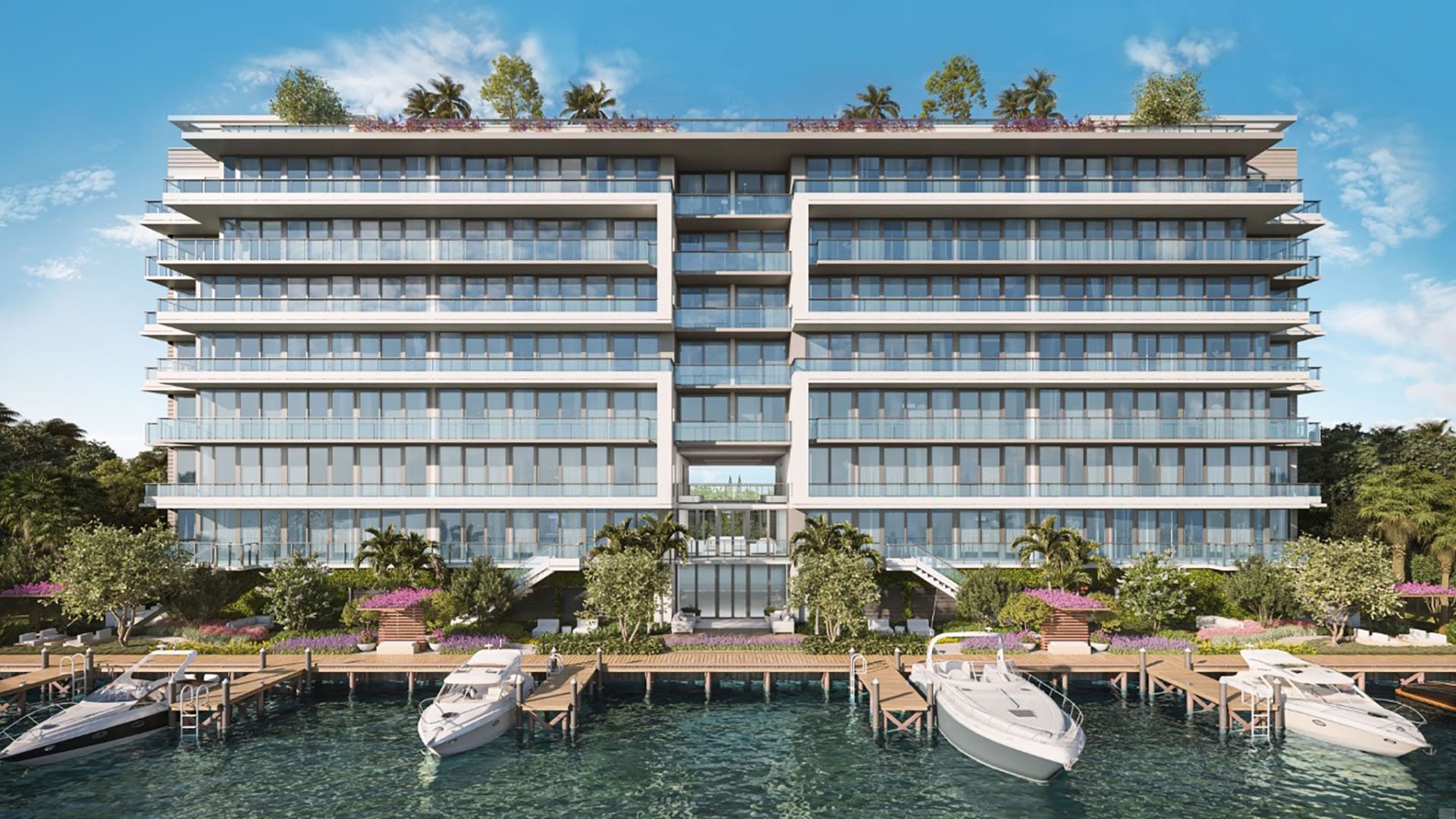 La Baia North Bay Harbor Islands, Miami, Florida waterfront exterior with marina yachts and modern facade, highlighting luxury and ultra luxury preconstruction condos on Biscayne Bay.