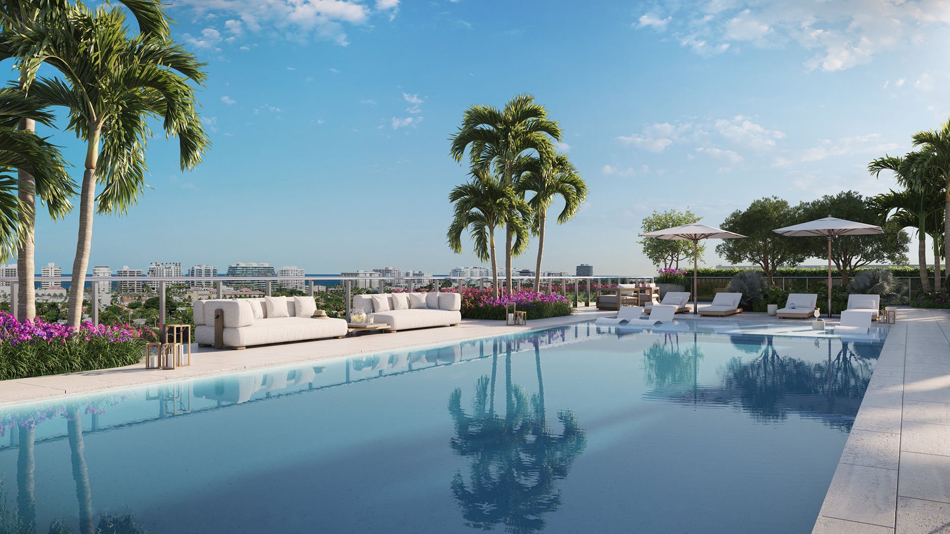 La Baia North Bay Harbor Islands rooftop resort-style swimming pool with palm trees, sun loungers and skyline views, featuring luxury and ultra luxury preconstruction condos amenities overlooking Miami.