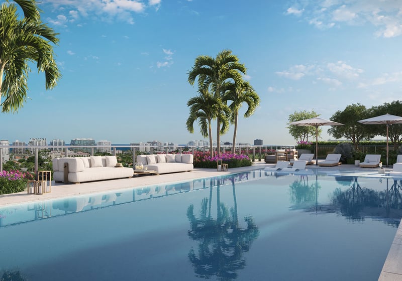 La Baia North Bay Harbor Islands rooftop resort-style swimming pool with palm trees, sun loungers and skyline views, featuring luxury and ultra luxury preconstruction condos amenities overlooking Miami.