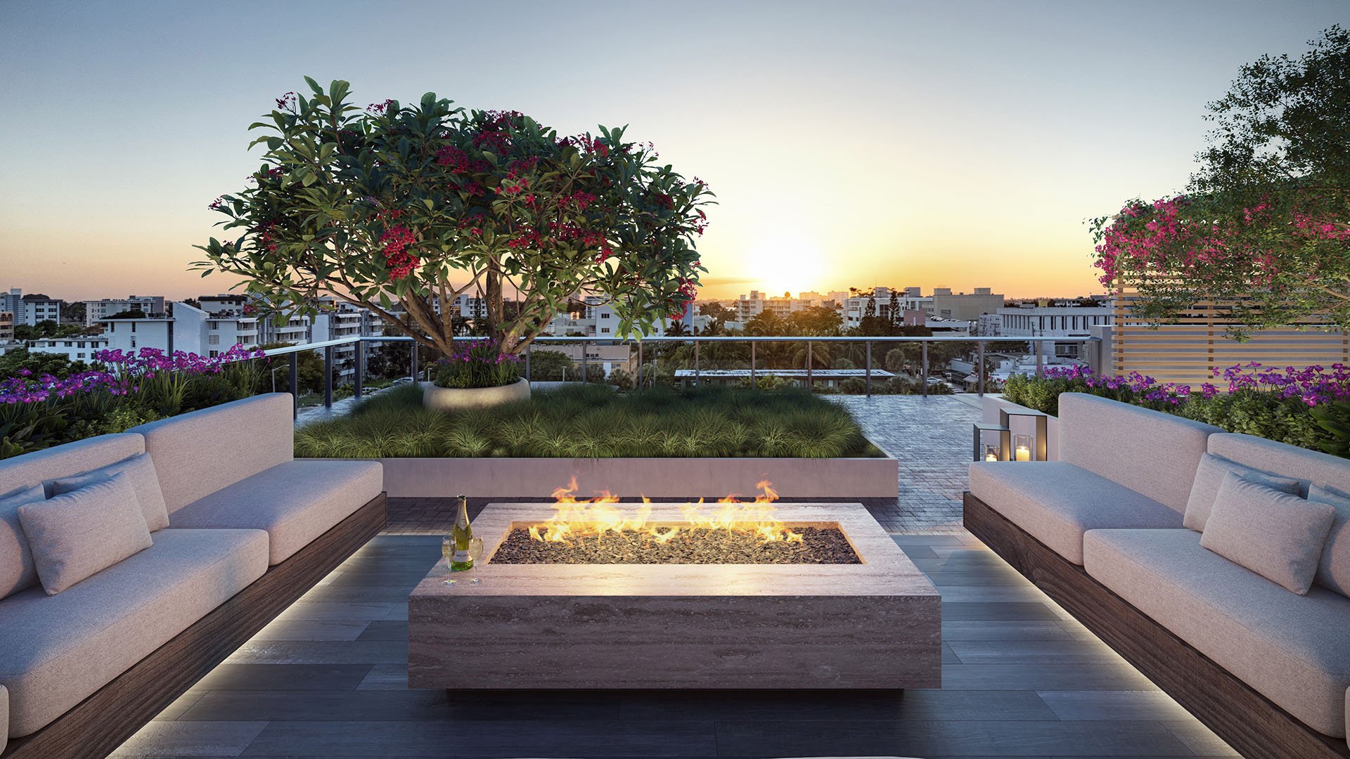 La Baia North Bay Harbor Islands rooftop sunset lounge with modern fire pit, plush outdoor seating and city skyline view, showcasing luxury and ultra luxury preconstruction condos lifestyle in Miami.