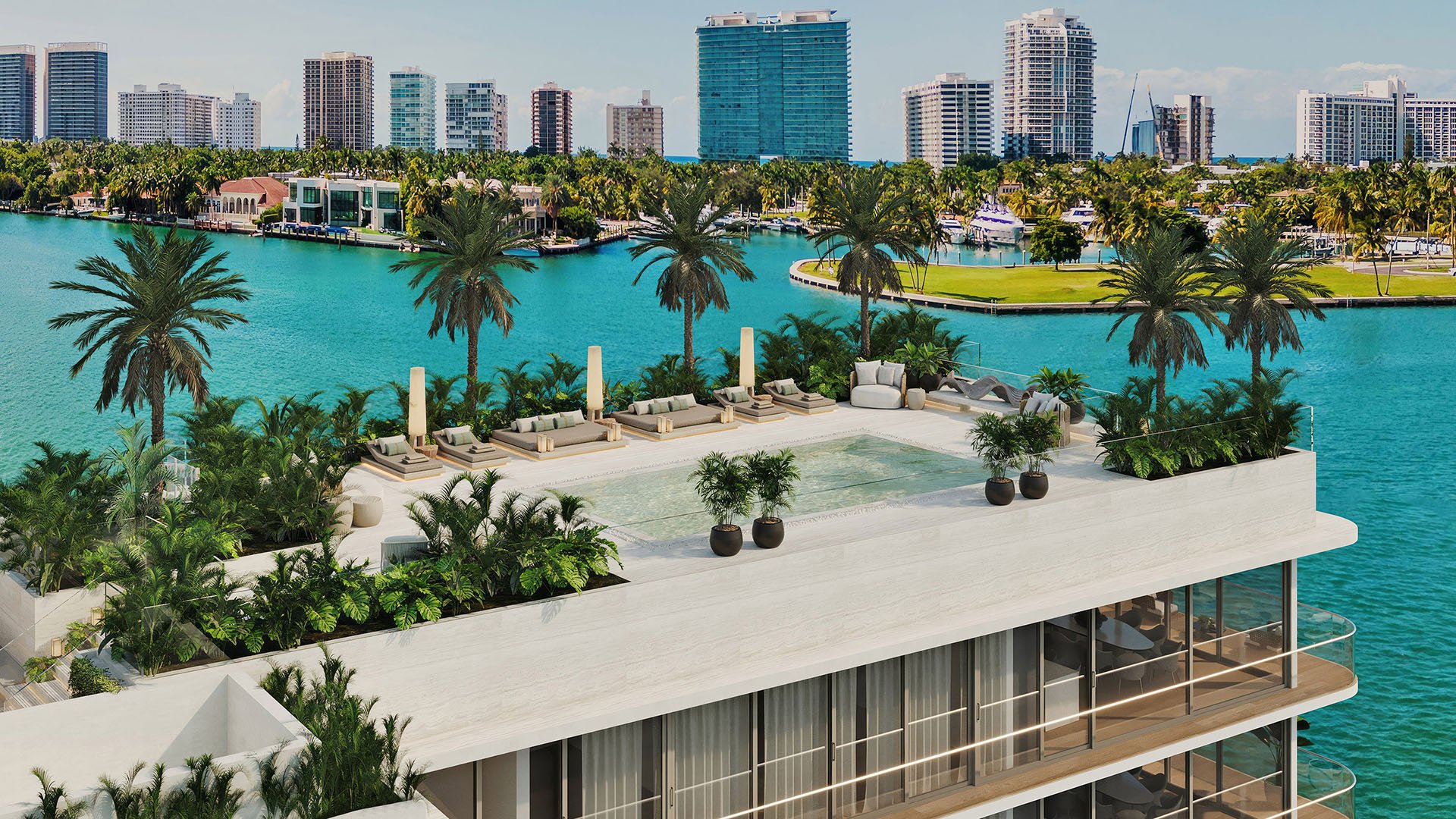 La Mare Bay Tower rooftop pool aerial in Bay Harbor Islands, Miami, Florida, overlooking waterfront bay, marina and skyline, showcasing luxury and ultra luxury preconstruction condos amenities.