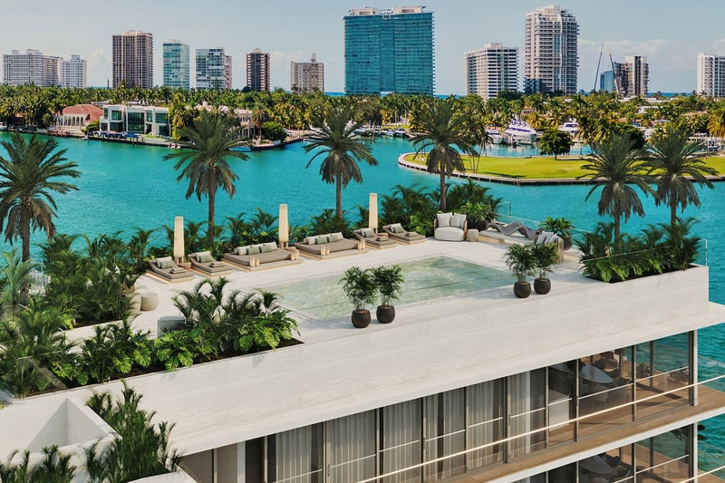 La Mare Bay Tower rooftop pool aerial in Bay Harbor Islands, Miami, Florida, overlooking waterfront bay, marina and skyline, showcasing luxury and ultra luxury preconstruction condos amenities.