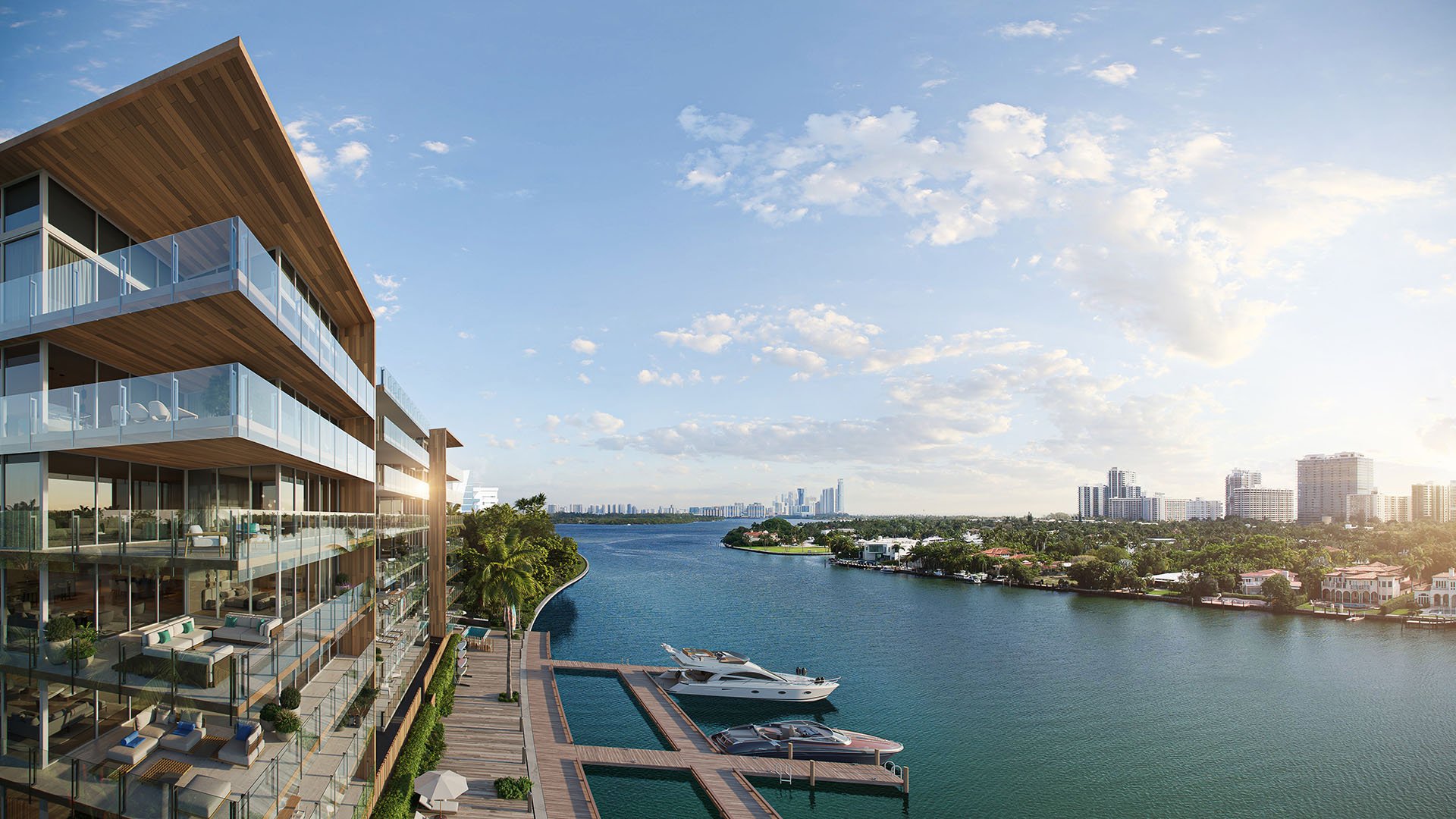 La Mare Regency Tower waterfront balconies in Bay Harbor Islands, Miami, Florida, overlooking marina yacht docks at sunset, showcasing luxury and ultra luxury preconstruction condos on the bay.