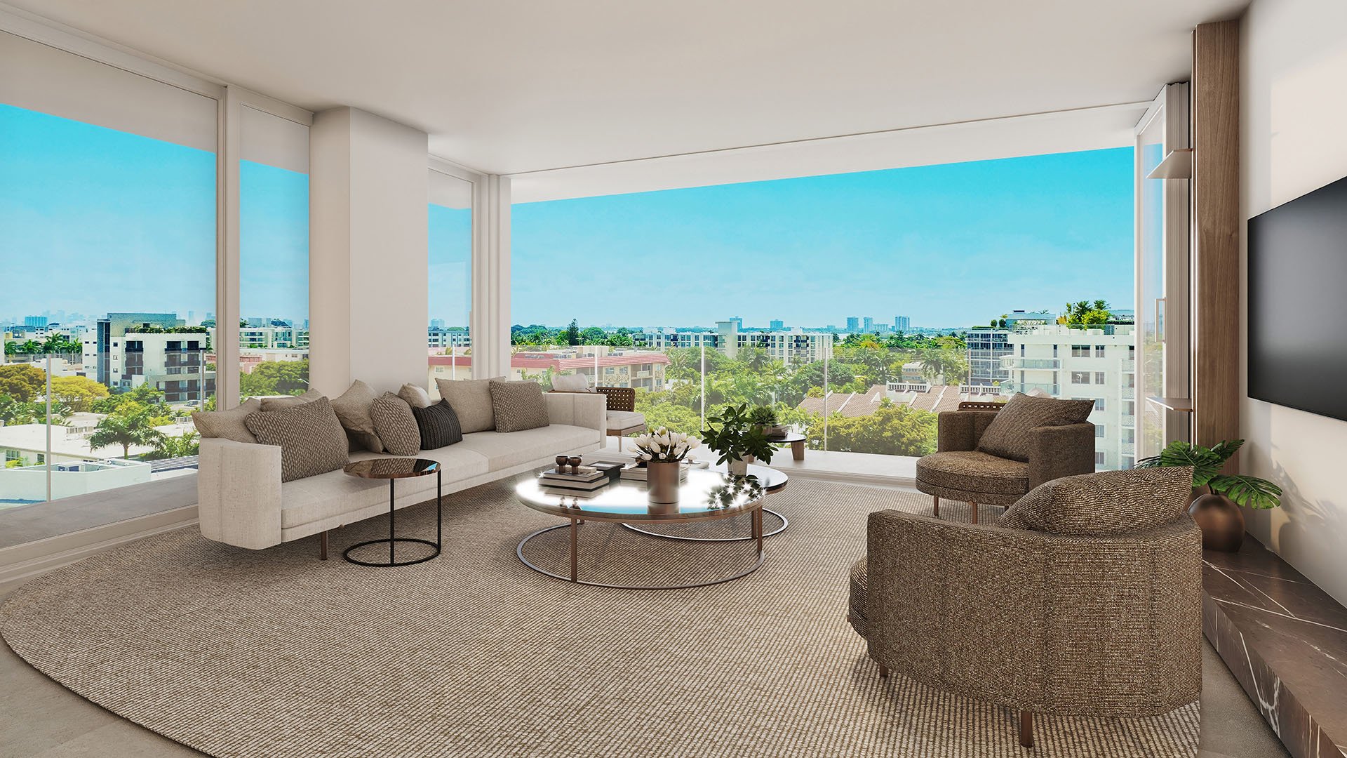 Corner suite living room with balcony and expansive city and bay views through floor-to-ceiling glass at La Mare Regency Tower unit 6E, Bay Harbor Islands, Miami, Florida, luxury and ultra luxury preconstruction condos design.
