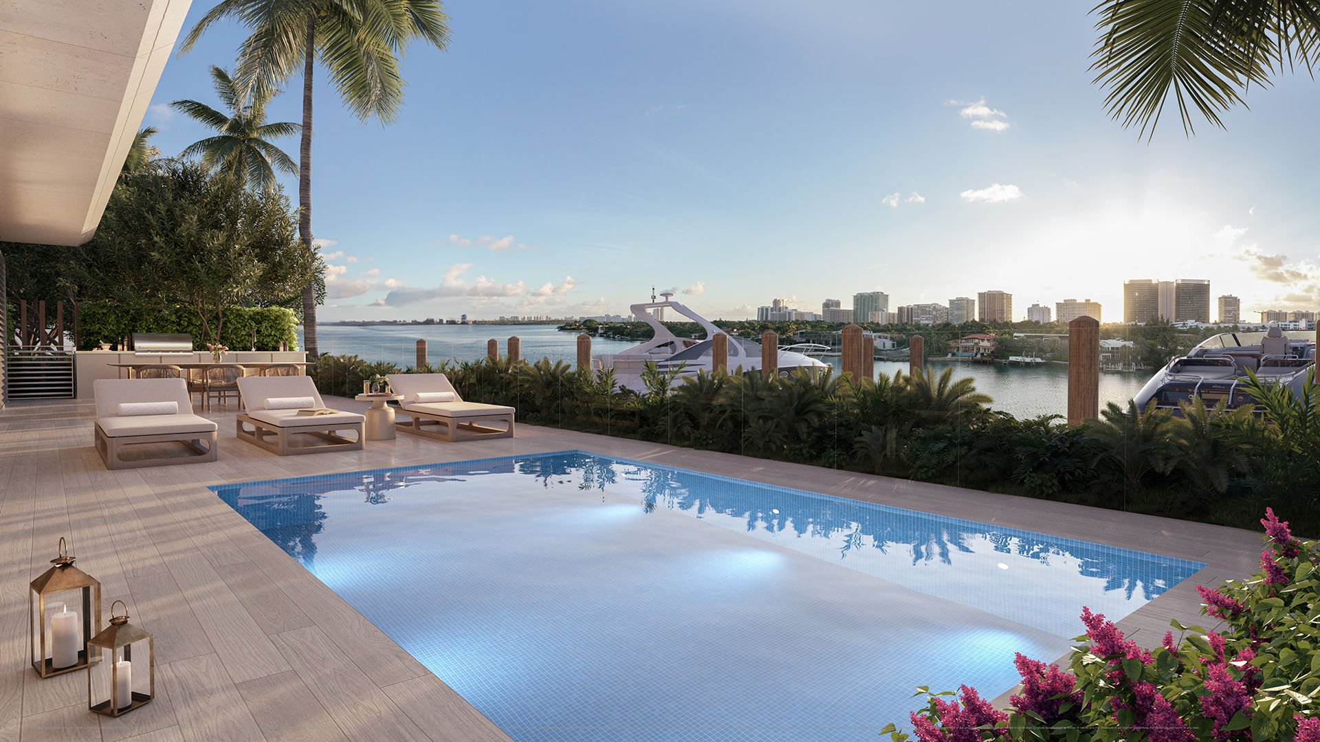 Sunset waterfront pool deck with yachts and Biscayne Bay views at La Mare Signature Tower bay villa, Bay Harbor Islands, Miami, Florida, showcasing luxury and ultra luxury preconstruction condos amenities.