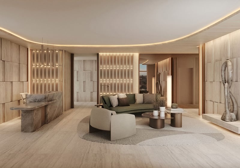 Reception lobby lounge with curved ceiling, cove lighting, stone and wood finishes at La Mare Signature Tower, Bay Harbor Islands, Miami, Florida, reflecting luxury and ultra luxury preconstruction condos arrival experience.