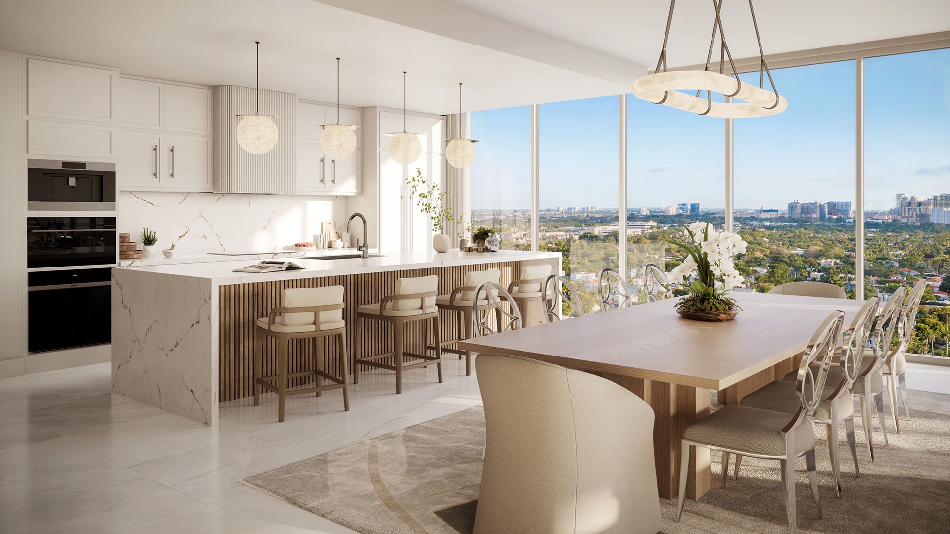Chef kitchen with island seating, dining table and wall-to-wall windows at Maison D'Or in West Palm Beach, highlighting luxury and ultra luxury preconstruction condos with bright panoramic dining views.