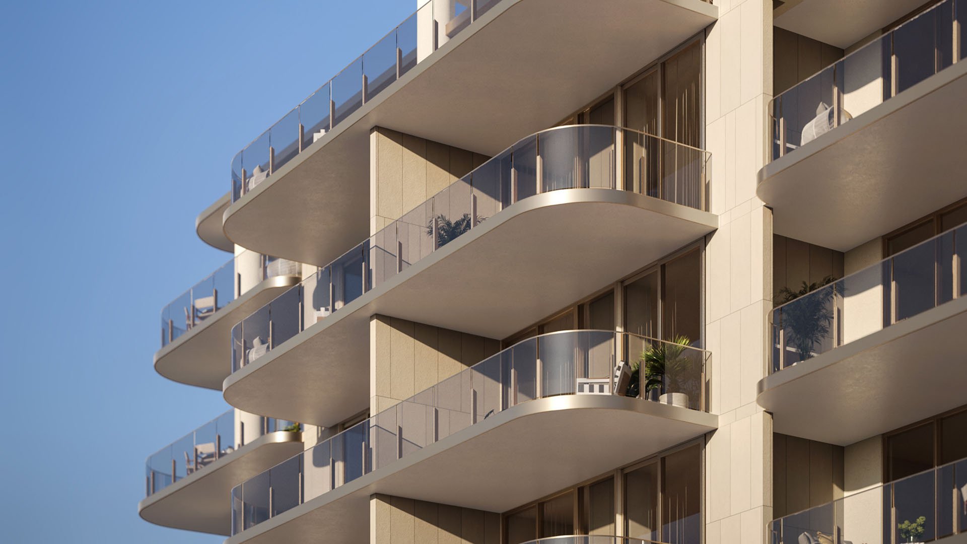 Close-up of curved glass balconies and warm-toned exterior detailing at Maison D'Or in West Palm Beach, highlighting luxury and ultra luxury preconstruction condos with expansive outdoor living space.