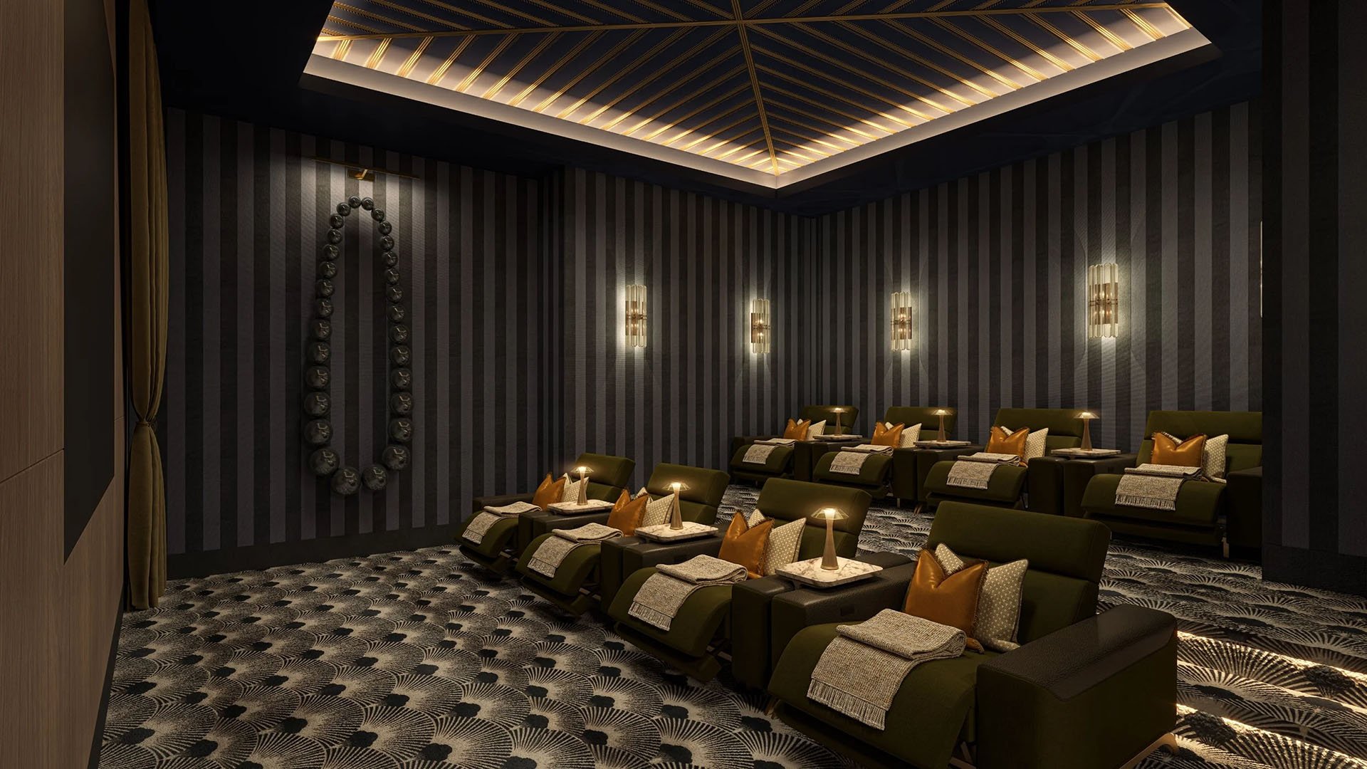Private screening room with plush recliner seating, dramatic wall sconces and dark patterned carpet at Maison D'Or in West Palm Beach, part of the luxury and ultra luxury preconstruction condos amenities.