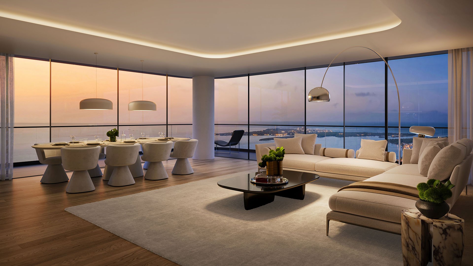 Mercedes-Benz Places Miami great room in Miami, Florida with living and dining area, panoramic bay views at sunset and modern lighting, expressing luxury and ultra luxury preconstruction condos interiors.