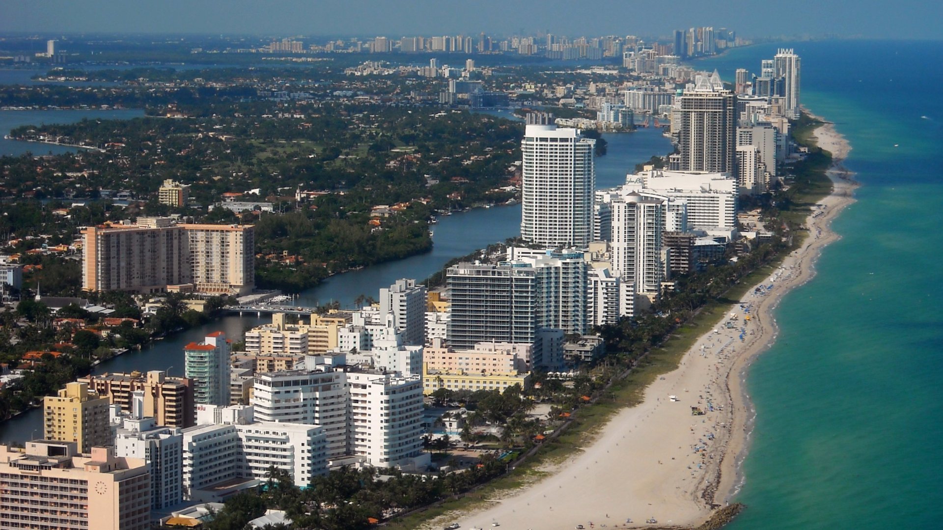 Miami Beach skyline on the water—resort towers and art‑deco legacy; prime destination for luxury and ultra luxury condos, with preconstruction and resale.