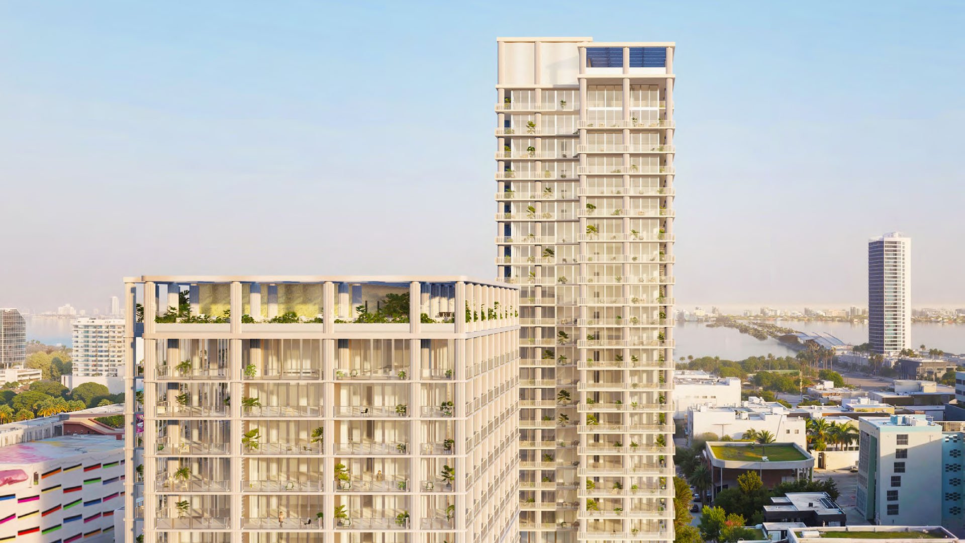 Preconstruction Miami Design Residences in Miami Design District, luxury and ultra luxury condos with a daytime tower and podium exterior overlooking the bay.