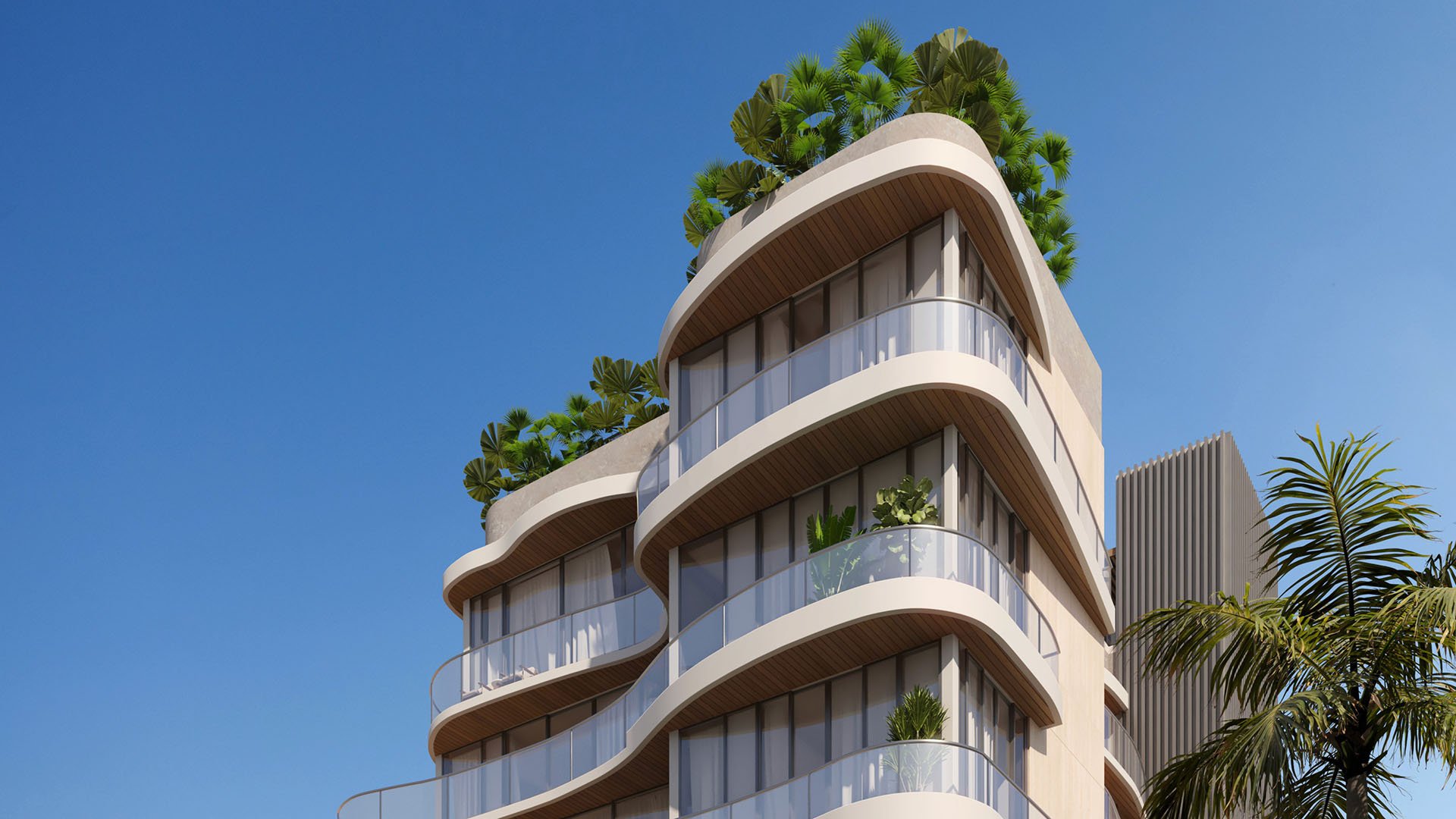 Mila Bay Harbor Islands preconstruction luxury and ultra luxury condos in Bay Harbor Islands with a curved condo corner exterior, wraparound glass balconies, warm soffits, and rooftop garden planting against a blue sky.