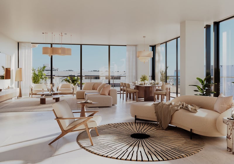 Mila Bay Harbor Islands preconstruction luxury and ultra luxury condos in Bay Harbor Islands with a wraparound glass living room, sculptural sofas, a dining area, and expansive natural light throughout.