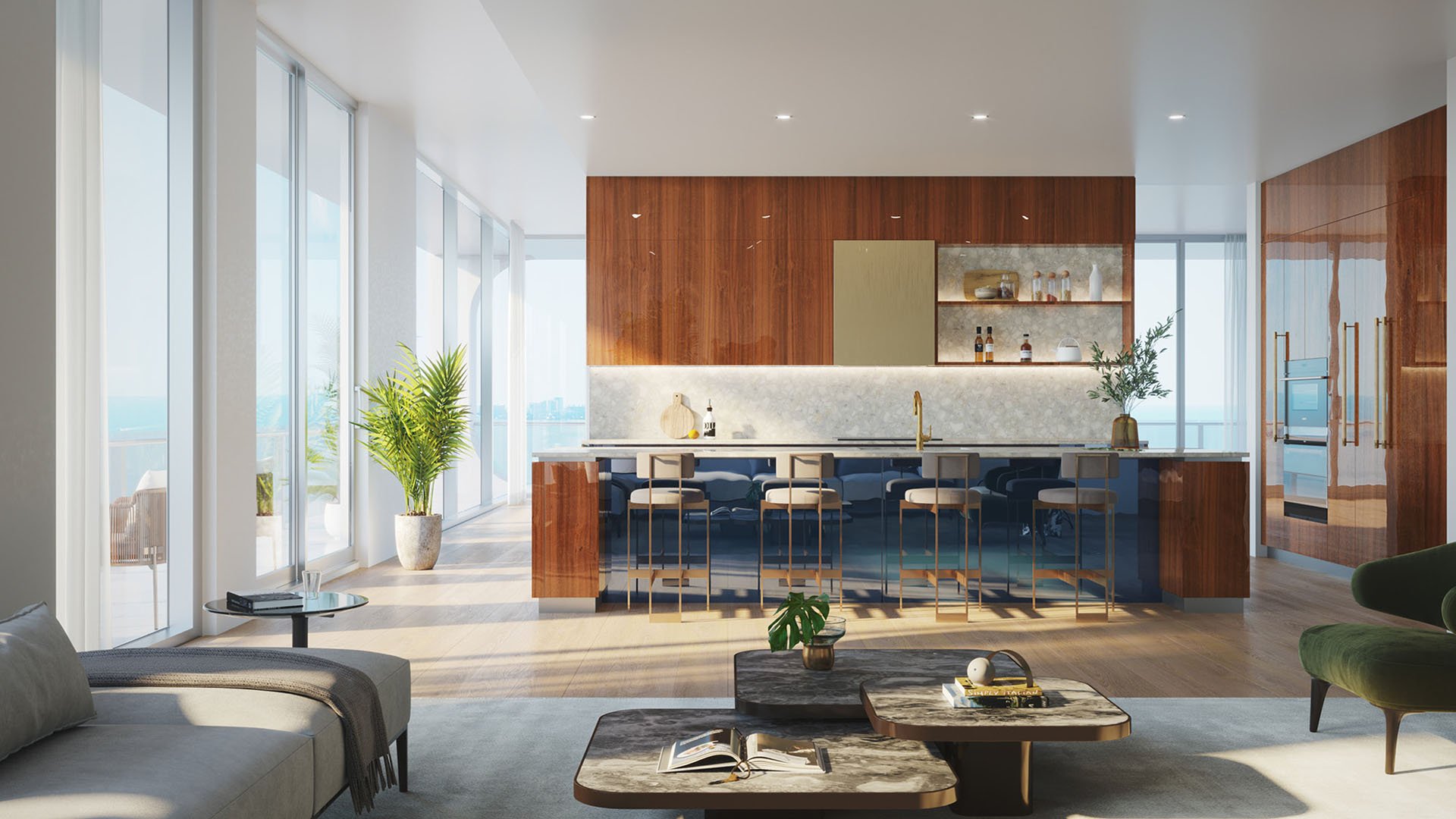 Grand living room and chef kitchen with a long island, marble finishes, and window walls at Mr C Residences Bayshore Tower in Coconut Grove, highlighting luxury, ultra luxury condos with expansive open plan living.