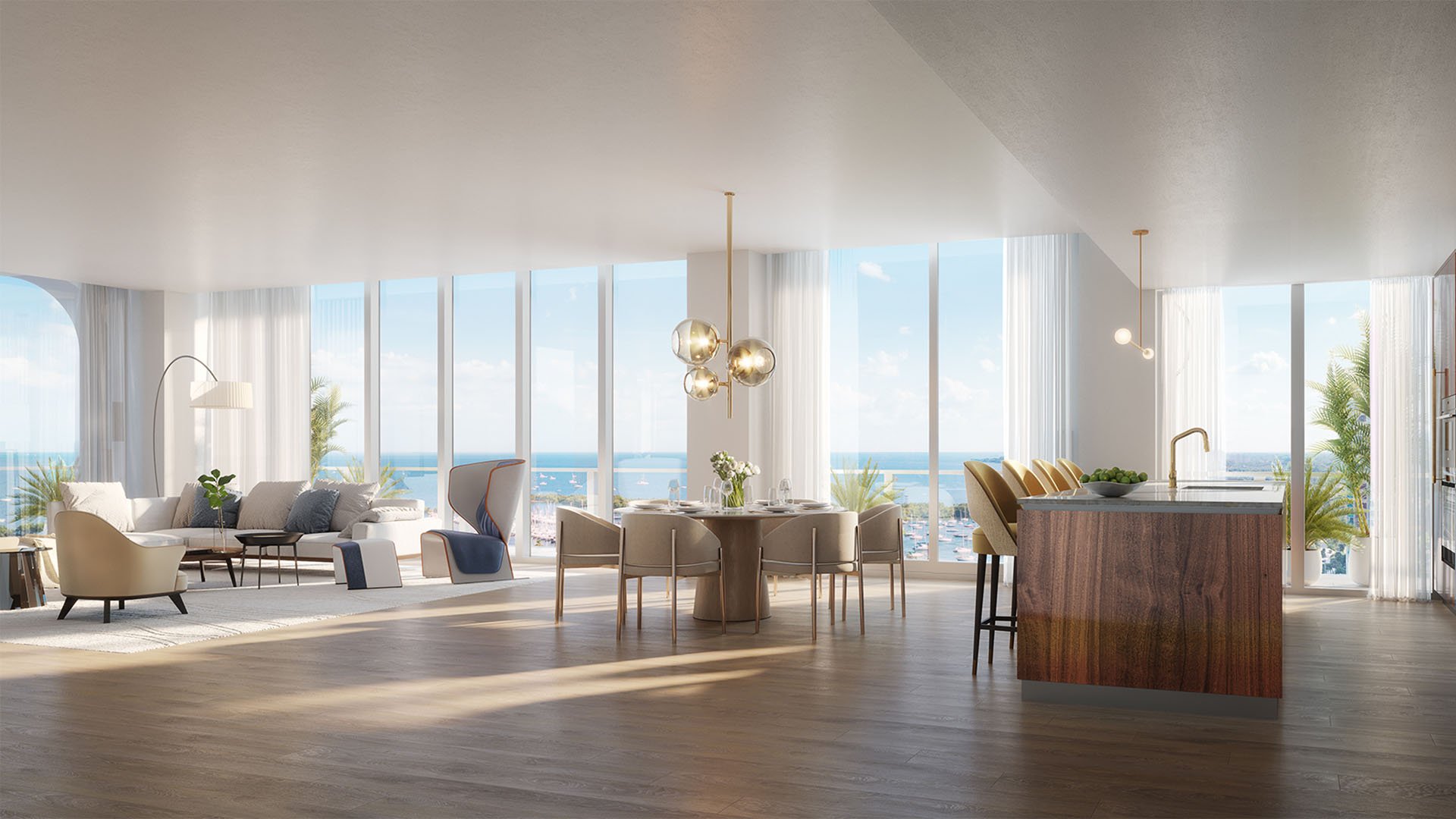 Open plan living, dining, and chef kitchen with floor-to-ceiling windows and bay views at Mr C Residences Bayshore Tower in Coconut Grove, presenting luxury, ultra luxury condos with bright waterfront interiors.