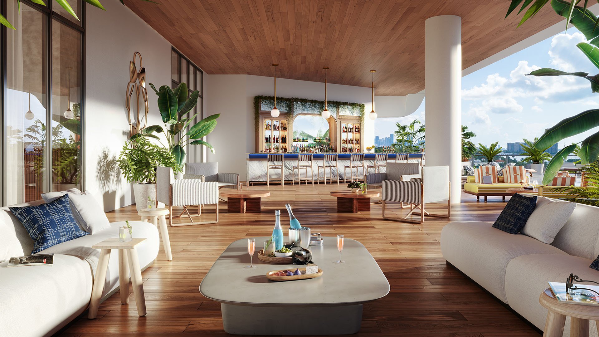Covered pool lounge with bar seating, open-air sofas and skyline views at Mr. C Residences Tigertail Tower, Coconut Grove, complementing luxury and ultra luxury condos.