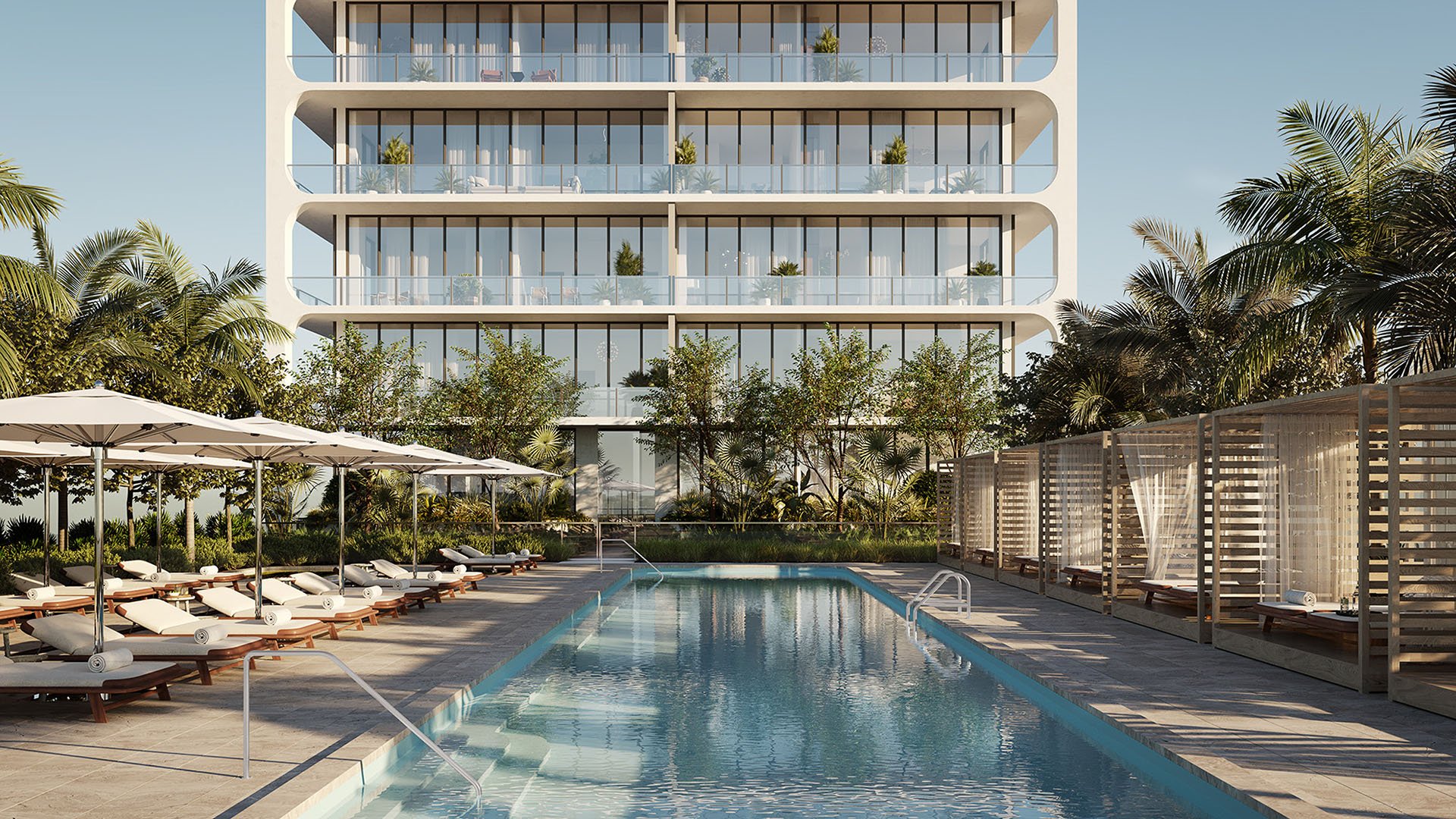 Resort pool courtyard with cabanas, loungers and the tower facade at Mr. C Residences Tigertail Tower, Coconut Grove, elevating luxury and ultra luxury condos.