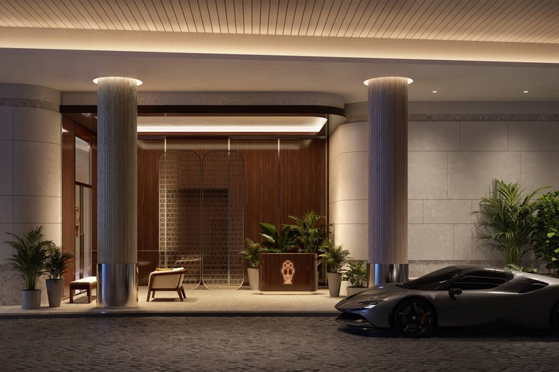 Mr. C Residences West Palm Beach arrival entrance with sports car, showcasing luxury and ultra luxury preconstruction condos lifestyle. Featuring hotel.