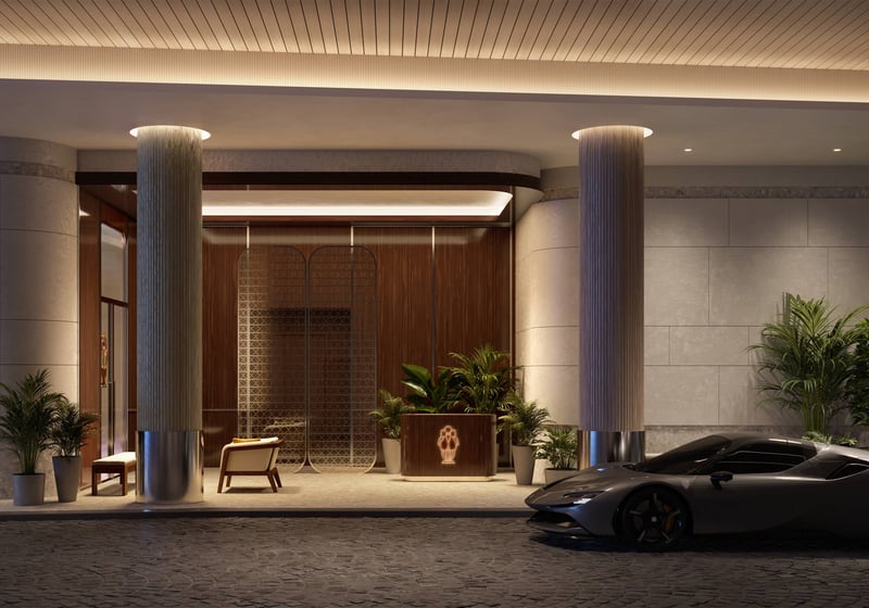 Mr. C Residences West Palm Beach arrival entrance with sports car, showcasing luxury and ultra luxury preconstruction condos lifestyle. Featuring hotel.