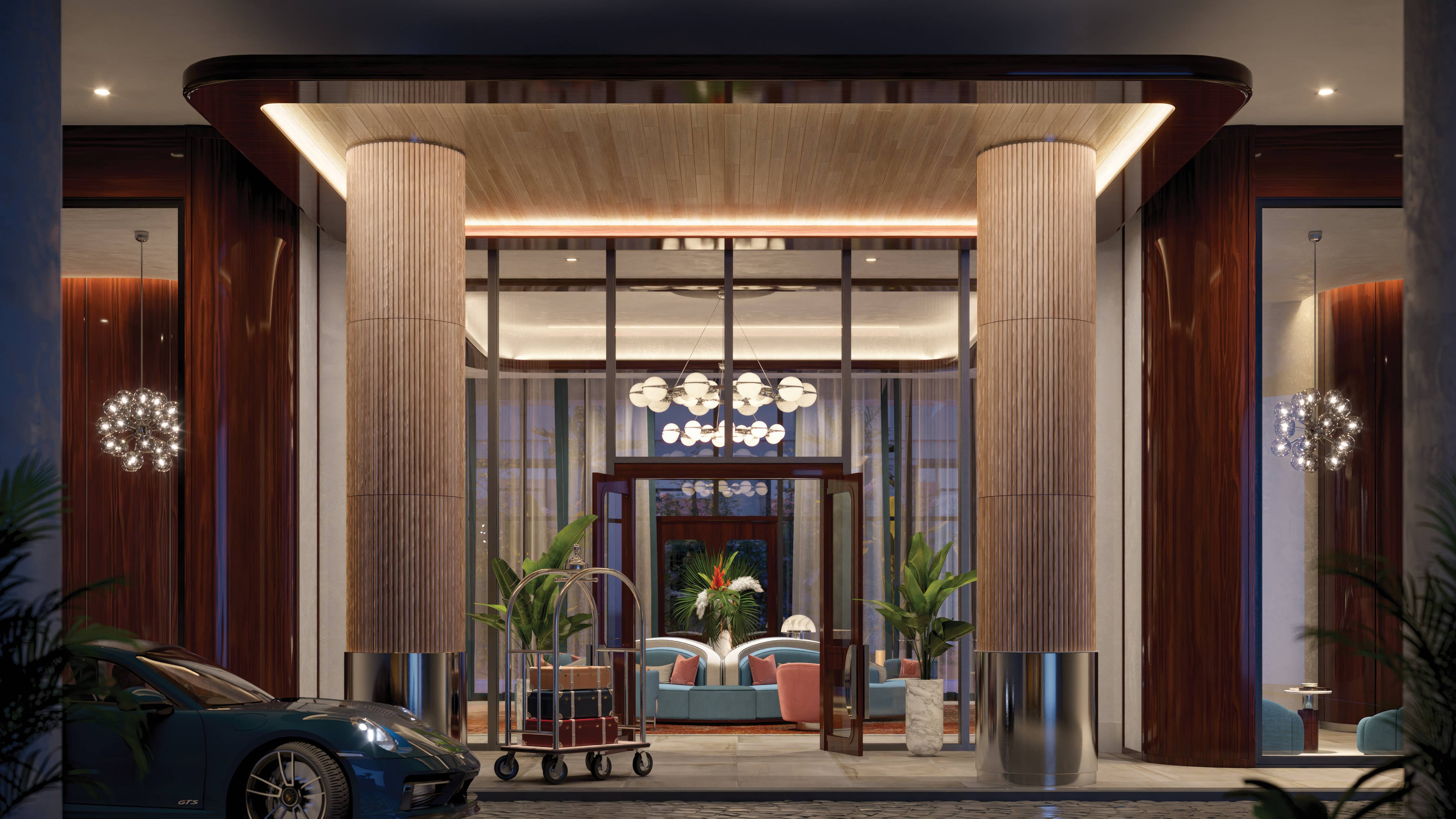 Mr. C Residences West Palm Beach grand entrance driveway, highlighting luxury and ultra luxury preconstruction condos and hotel-style service.