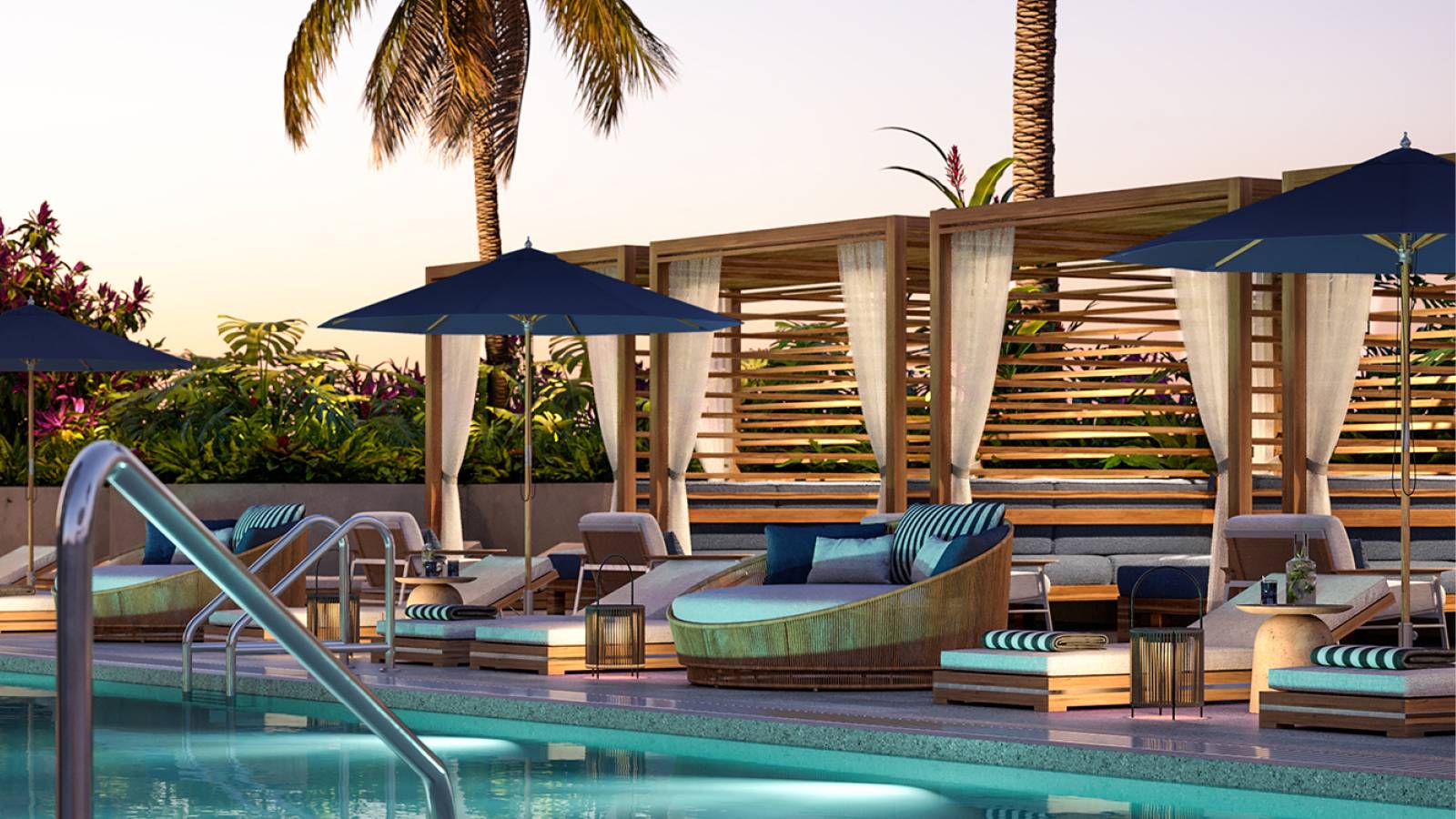 Mr. C Residences West Palm Beach poolside lounge at sunset, showcasing luxury and ultra luxury preconstruction condos amenities.