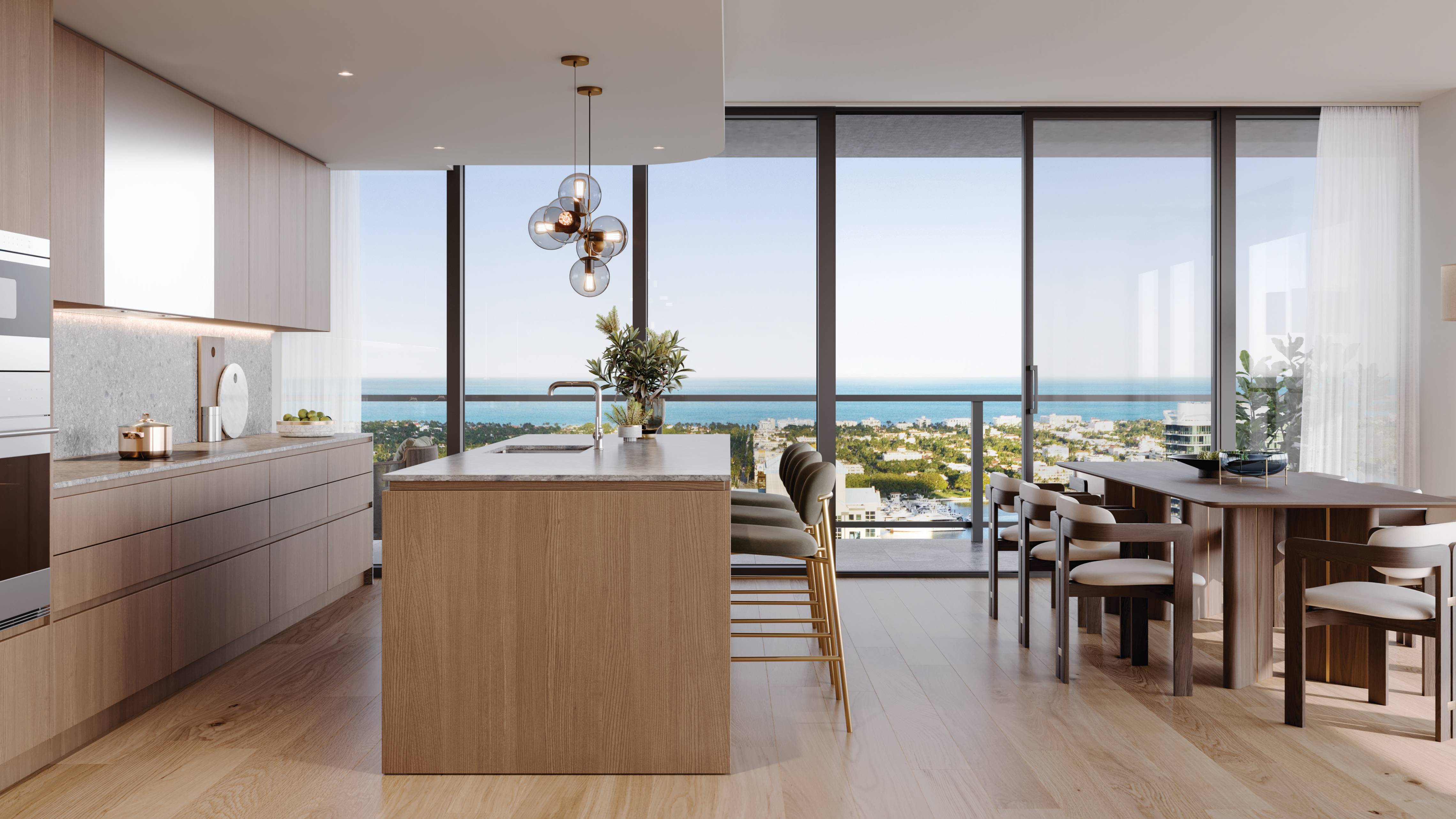 Mr. C Residences West Palm Beach kitchen with ocean view, showcasing luxury and ultra luxury preconstruction condos lifestyle. Featuring modern.