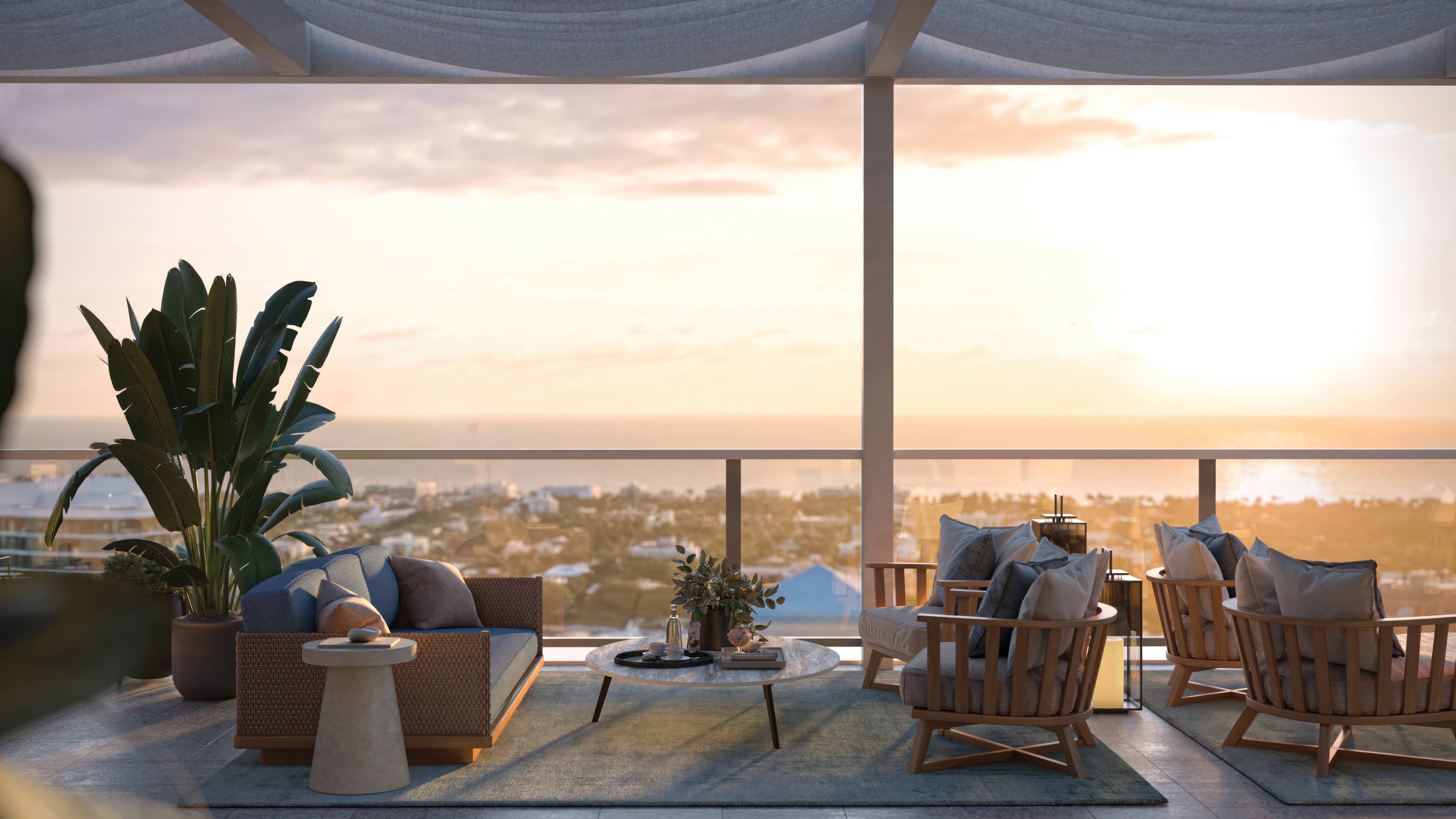 Mr. C Residences West Palm Beach sunset balcony living space, showcasing luxury and ultra luxury preconstruction condos outdoor terrace.