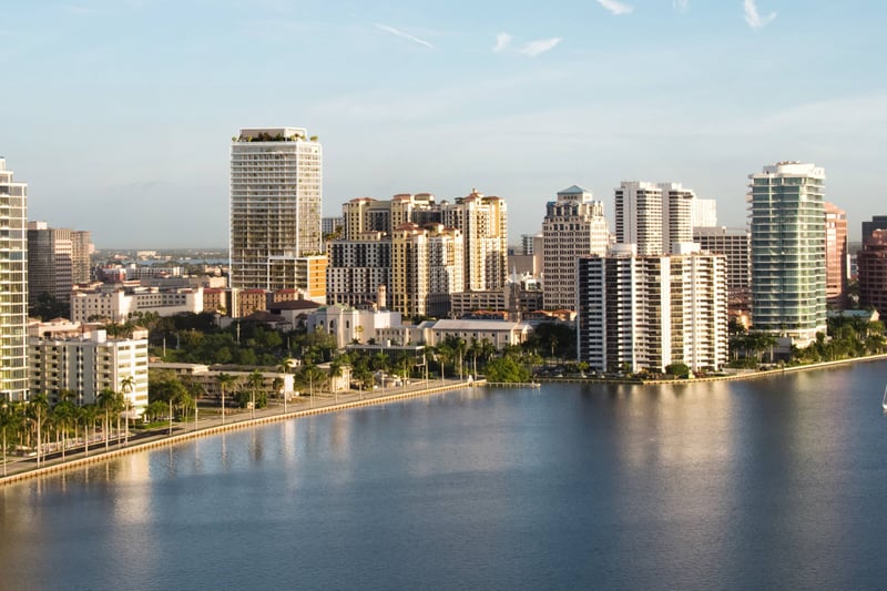 Mr. C Residences West Palm Beach urban waterfront skyline view, highlighting luxury and ultra luxury preconstruction condos.