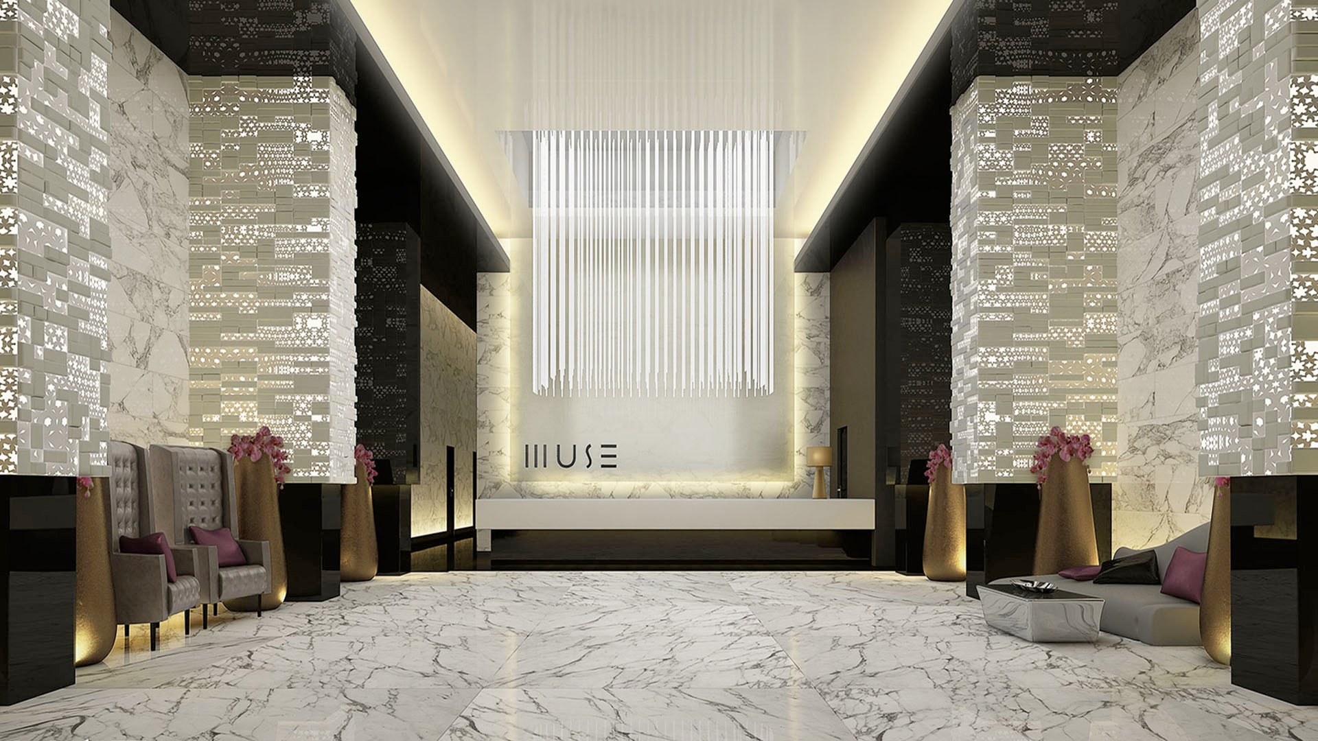 Double-height lobby with marble floors, patterned walls, and dramatic lighting at Muse Residences in Sunny Isles Beach, welcoming residents to luxury and ultra luxury condos.