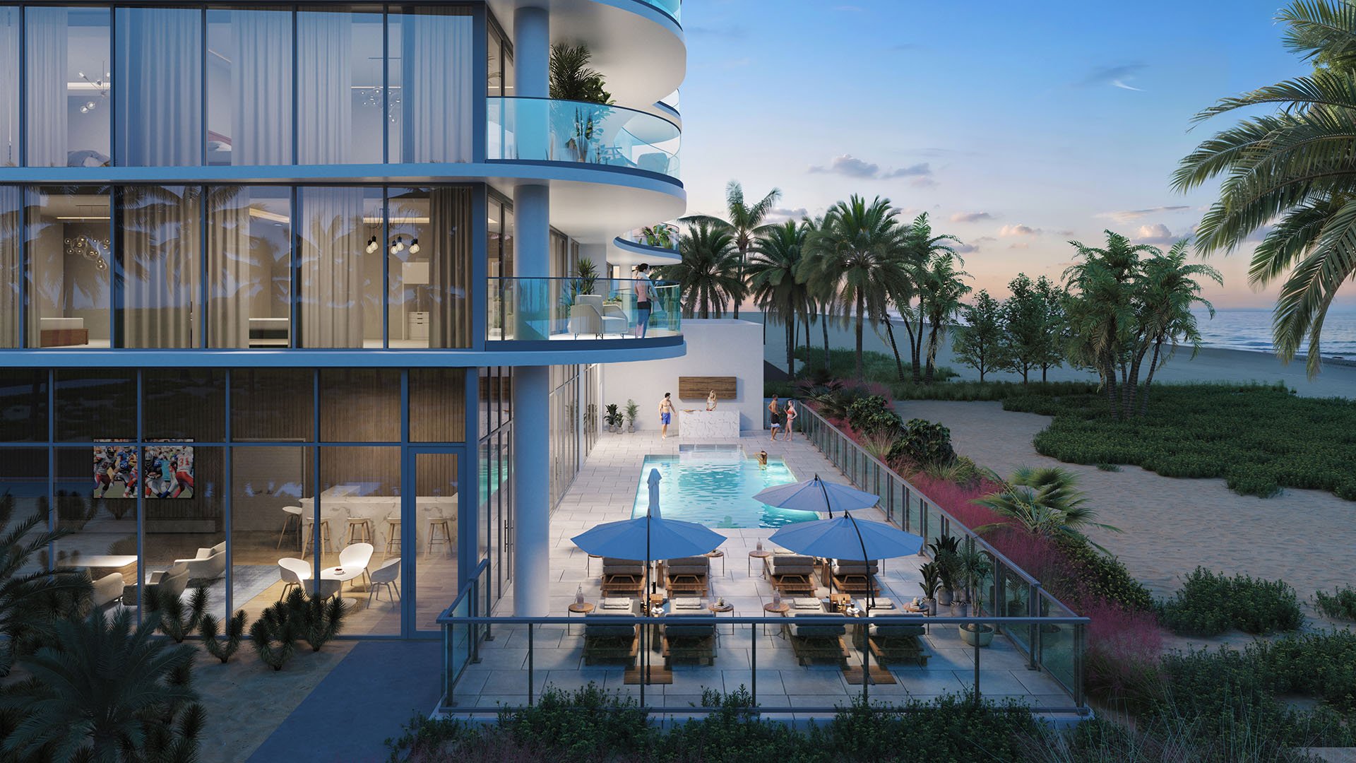 Beachfront pool terrace at Ocean 580 in Pompano Beach, preconstruction luxury and ultra luxury condos with a rectangular pool, chaise lounges, umbrellas, glass railings and direct beachside surroundings at dusk.