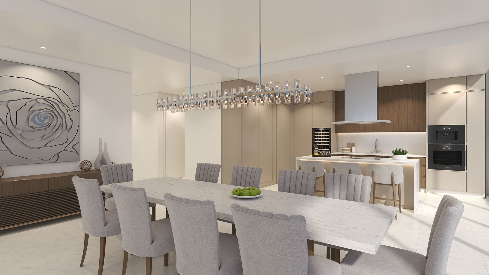 Open-concept chef kitchen and dining room at Ocean 580 in Pompano Beach, preconstruction luxury and ultra luxury condos with a marble dining table, island seating, built-in appliances and a wine fridge.