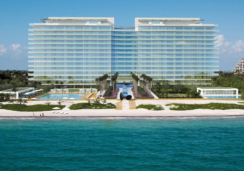 Aerial view of Oceana Key Biscayne in Key Biscayne, where luxury and ultra luxury condos rise above the beach with broad glass balconies, landscaped grounds, pools, and direct waterfront frontage.