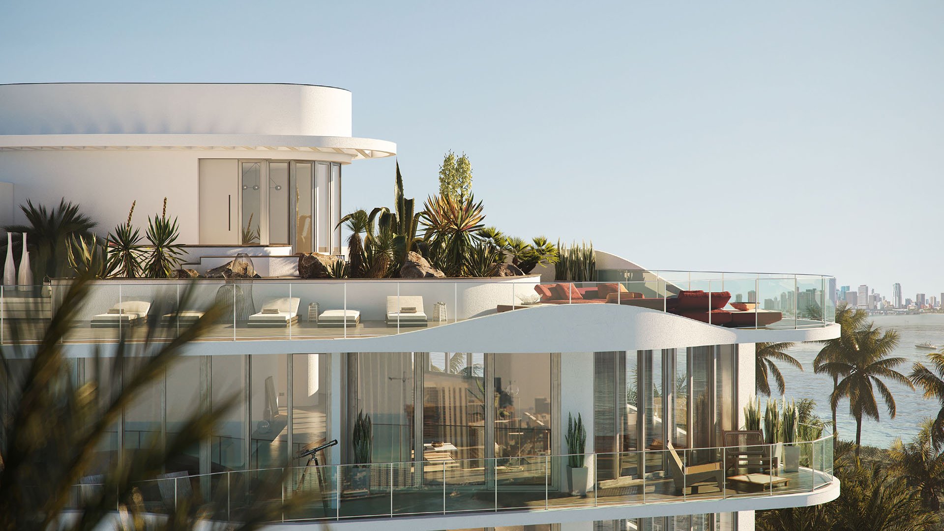 Onda Bay Harbor penthouse rooftop terrace in Bay Harbor Islands, Miami, Florida with landscaped outdoor lounge, sunbeds and skyline/Biscayne Bay views—luxury and ultra luxury preconstruction condos.