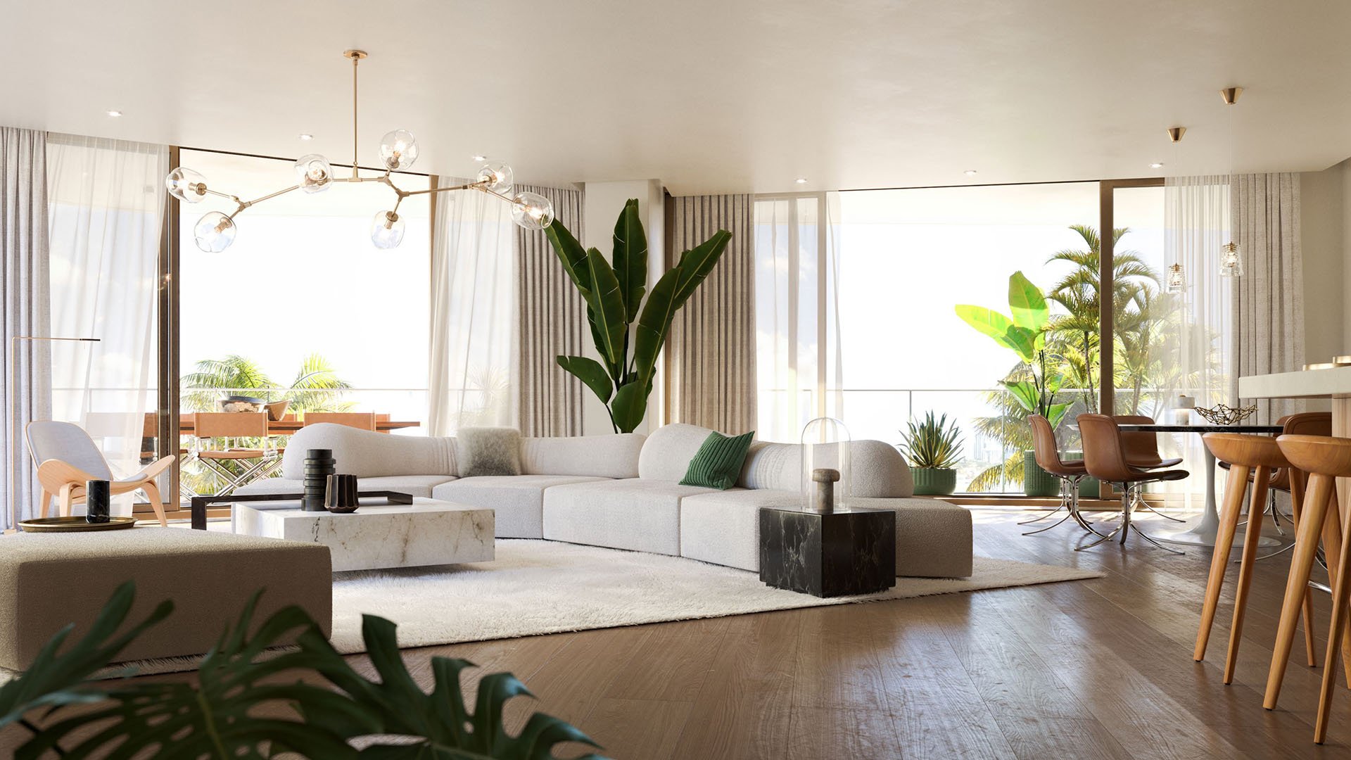 Open-concept living and dining at Onda, Bay Harbor Islands, Miami, Florida, with floor-to-ceiling glass, modern kitchen bar and balcony water views, showcasing luxury and ultra luxury preconstruction condos.