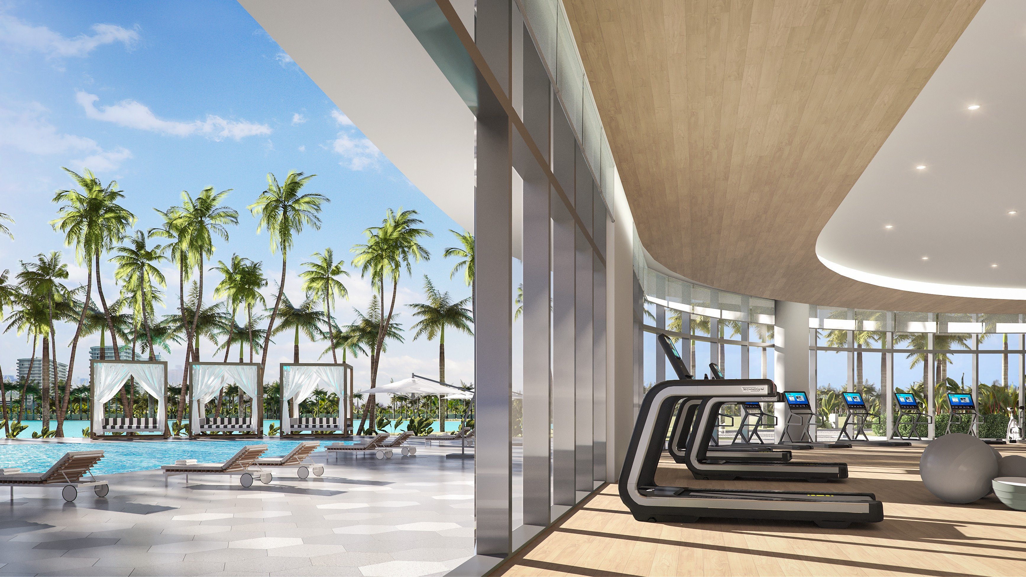 One Park Tower by Turnberry gym overlooking pool and palms in North Miami; luxury wellness amenity for ultra luxury preconstruction condos at SoLé Mia.