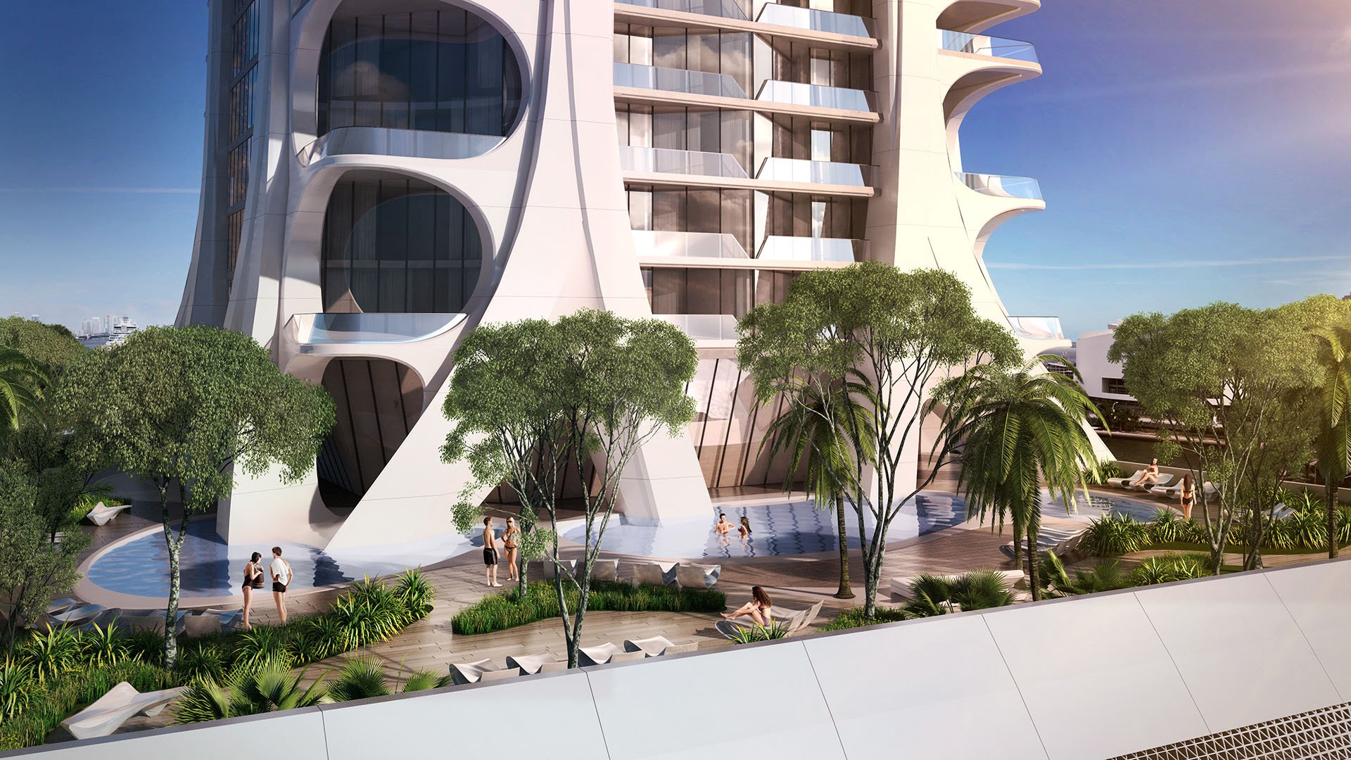 Podium courtyard at One Thousand Museum in Downtown Miami with reflecting pools, palms, and the sculptural tower base for luxury and ultra luxury condos.