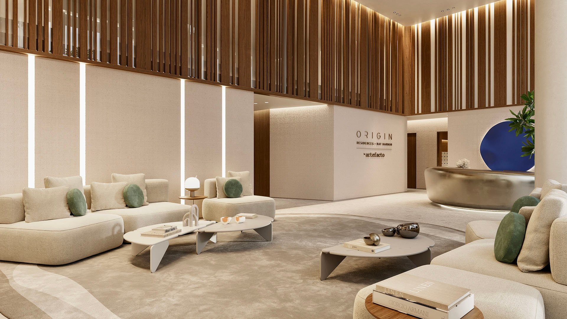 Origin Residences Bay Harbor Islands double-height lobby with lounge seating and curved reception desk near Origin Residences signage, showcasing luxury and ultra luxury preconstruction condos in Bay Harbor Islands, Miami, Florida.