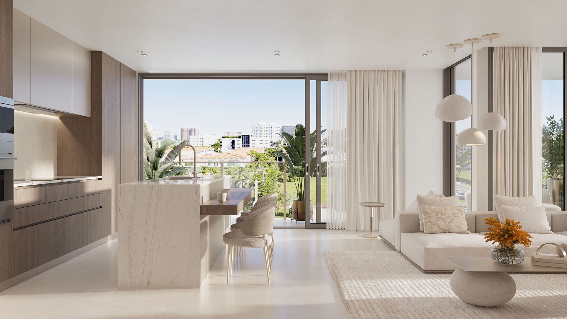 Origin Residences Bay Harbor Islands Unit 406 open-concept kitchen with marble island, bar seating and sliding glass doors to balcony, showcasing luxury and ultra luxury preconstruction condos in Bay Harbor Islands, Miami, Florida.
