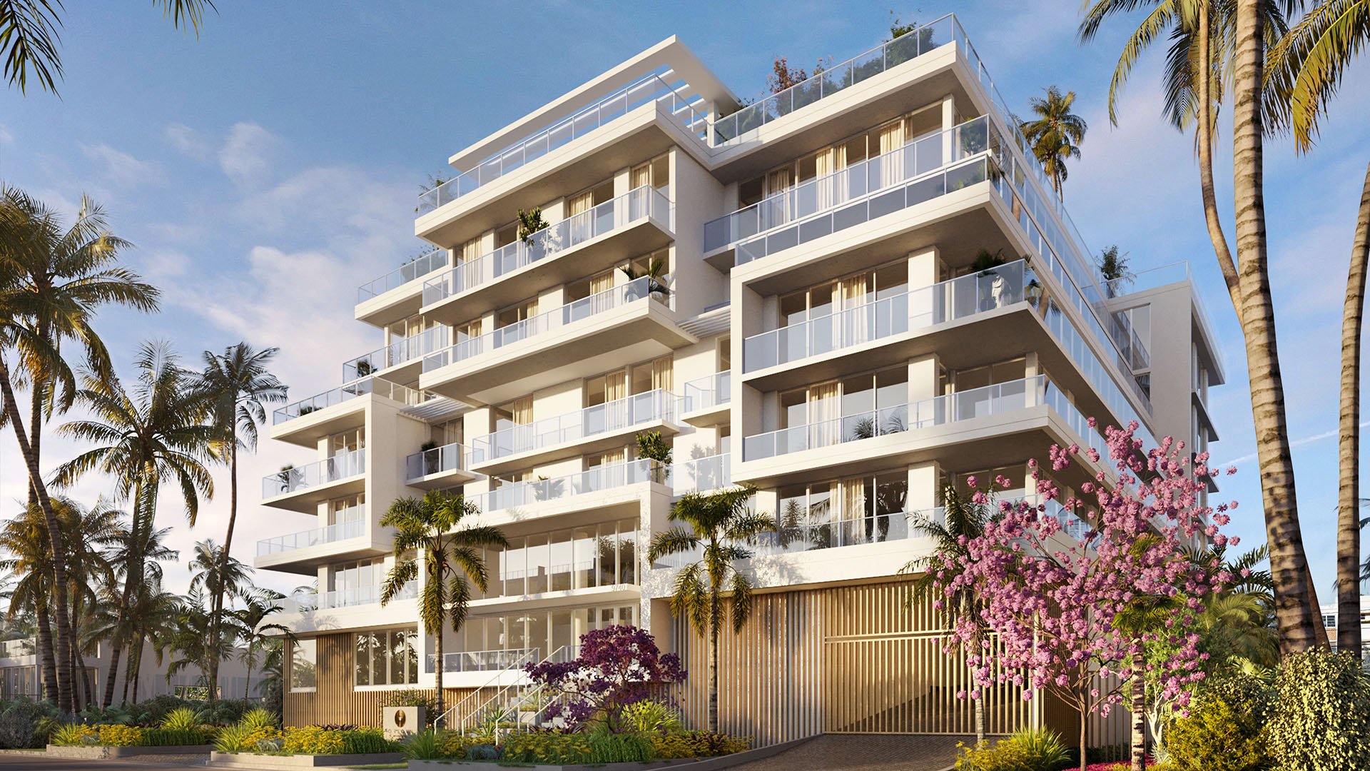 Origin Residences Bay Harbor Islands, Miami, Florida street-level corner exterior rendering with landscaped entry and wraparound glass balconies, showcasing luxury and ultra luxury preconstruction condos.