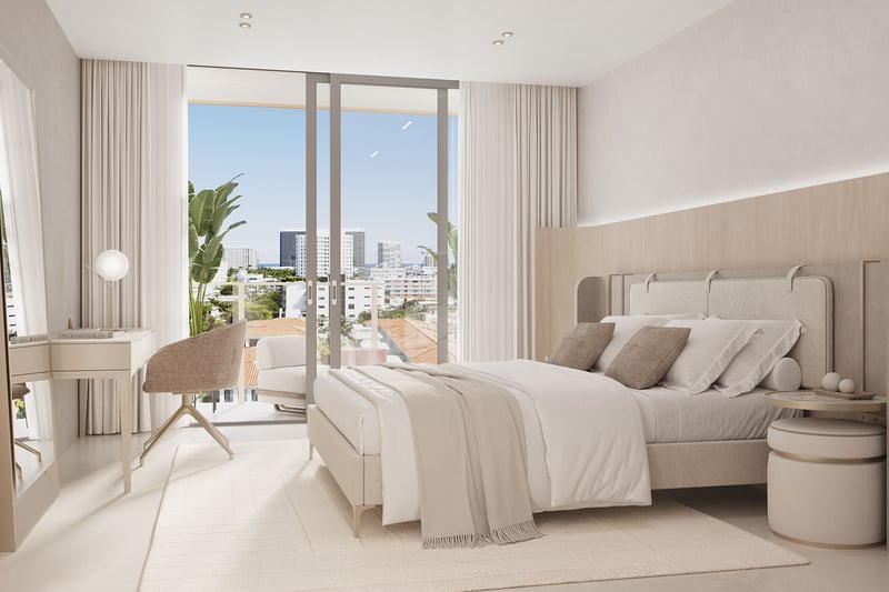 Origin Residences Bay Harbor Islands, Miami, Florida Unit 604 bedroom interior rendering with desk/vanity, upholstered bed and balcony city view, showcasing luxury and ultra luxury preconstruction condos.