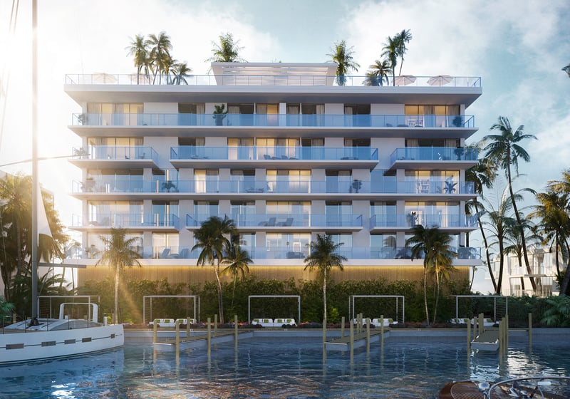 Sunrise marina view of Origin Residences Bay Harbor Islands waterfront building with glass balconies, palm trees and docks, Miami, Florida, featuring luxury and ultra luxury preconstruction condos with boat slips.