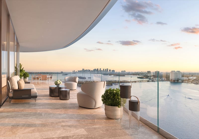 Pagani Residences North Bay Village Miami waterfront terrace balcony at sunset with Biscayne Bay and Downtown Miami skyline views, showcasing luxury and ultra luxury preconstruction condos outdoor living.