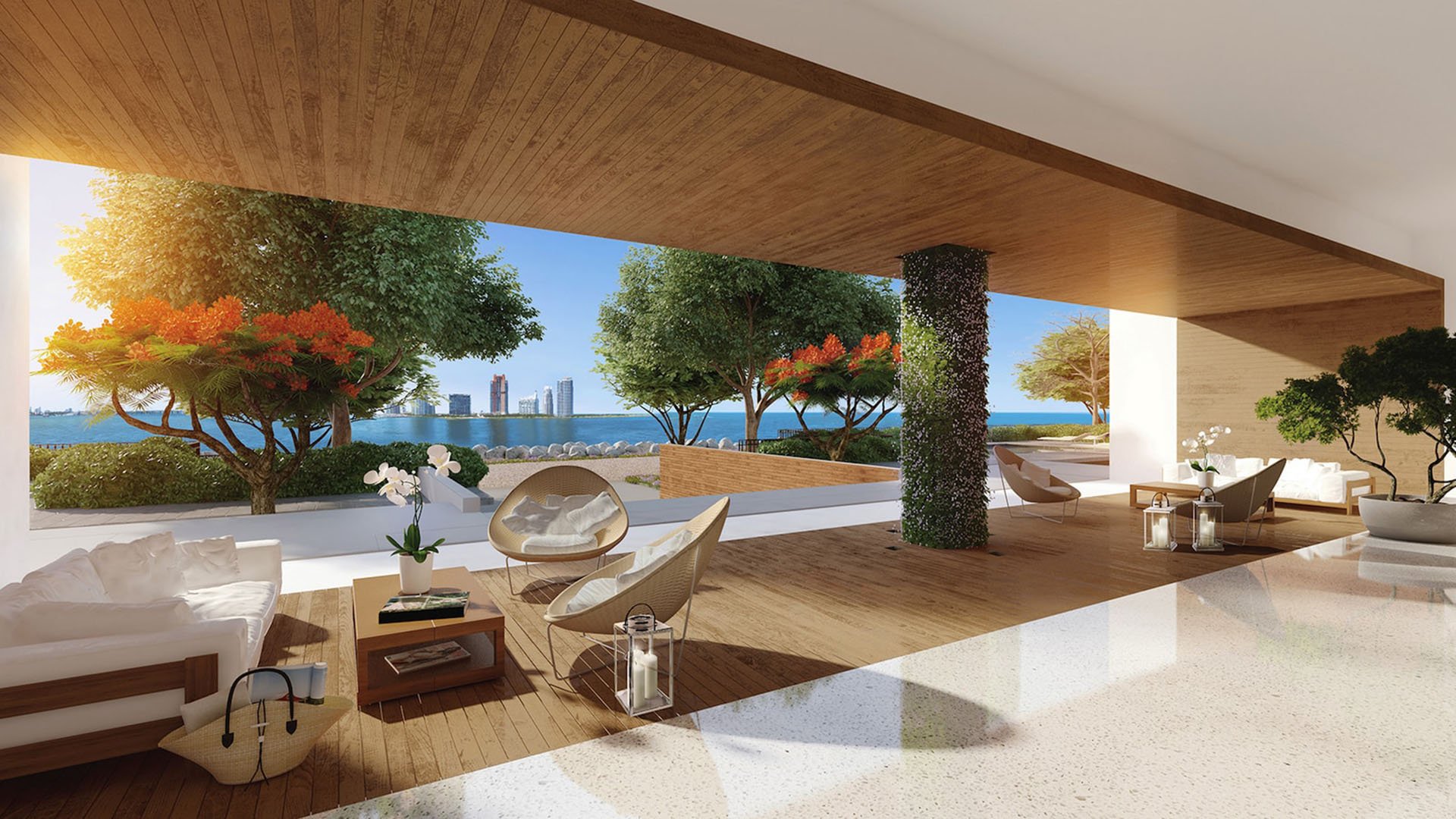 Open-air pavilion lounge at Palazzo del Sol, Fisher Island, showing luxury and ultra luxury condos with a wood ceiling, broad columns, and framed skyline views across the water.