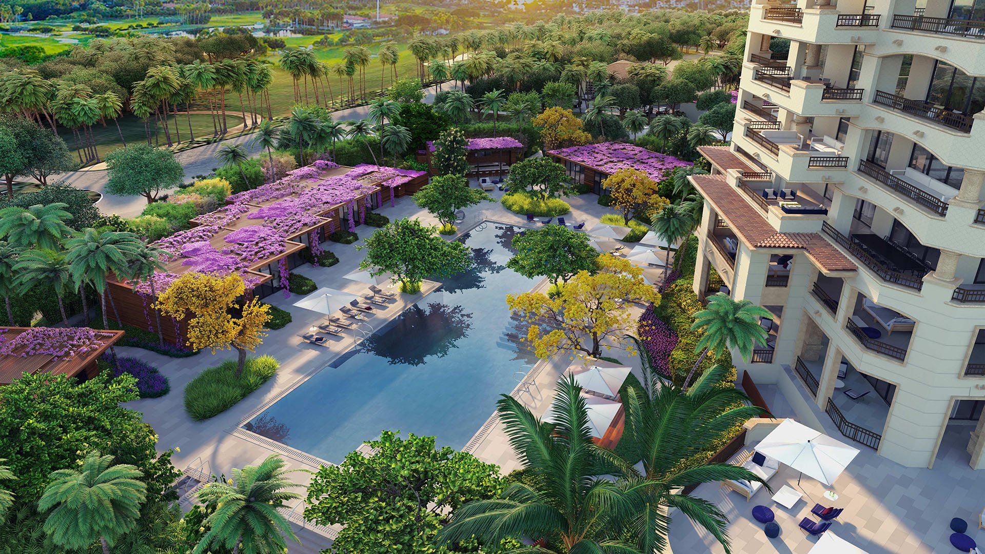 Palazzo della Luna in Fisher Island luxury and ultra luxury condos with an aerial pool terrace, pergola lounge areas, sun deck seating, and lush tropical landscaping.