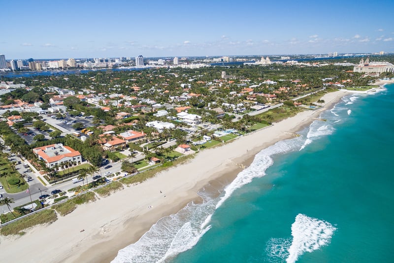 Palm Beach, Florida coastline and island vistas from above, iconic Gold Coast setting for luxury and ultra luxury condos; robust preconstruction and resale inventory. Featuring coastal, aerial, and view.