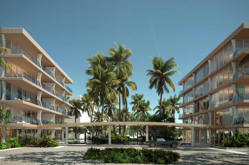 Arrival courtyard at Palm Beach Residences by Aman, Palm Beach, Florida, twin modern condo buildings around a palm-lined porte-cochere and circular drive, featuring luxury and ultra luxury preconstruction condos with hotel-style entry.