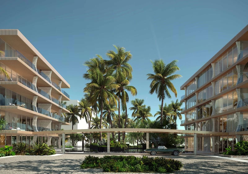 Arrival courtyard at Palm Beach Residences by Aman, Palm Beach, Florida, twin modern condo buildings around a palm-lined porte-cochere and circular drive, featuring luxury and ultra luxury preconstruction condos with hotel-style entry.
