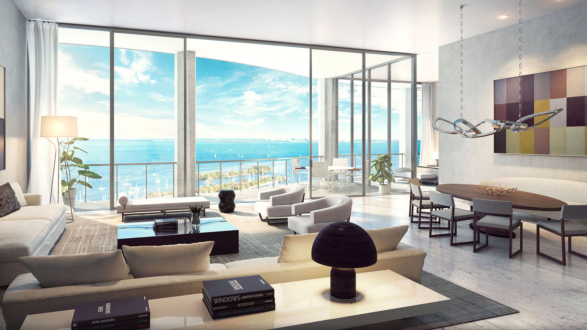 Open concept living and dining room with floor-to-ceiling glass, terrace access and wide bay views at Park Grove in Coconut Grove, designed for luxury and ultra luxury condos living.