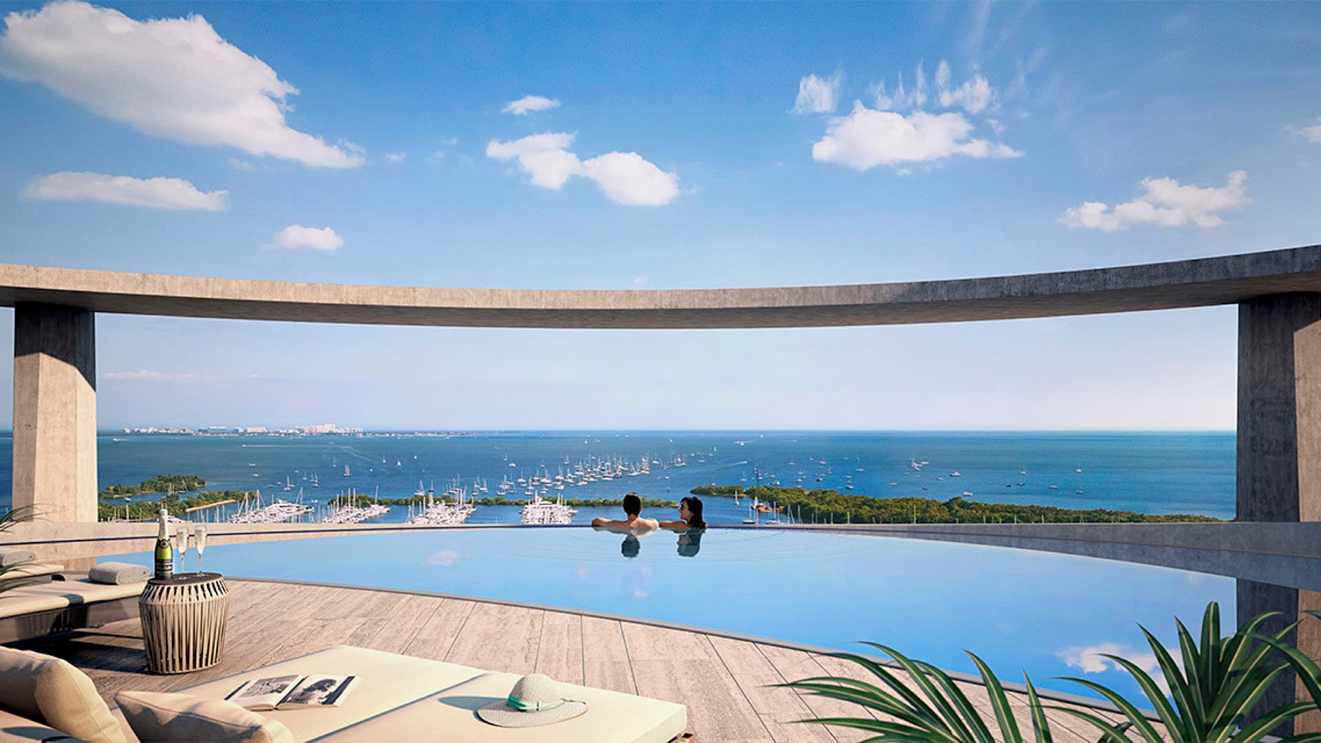 Rooftop infinity pool terrace framed by a circular overhang and wide water views at Park Grove in Coconut Grove, an elevated amenity for luxury and ultra luxury condos.